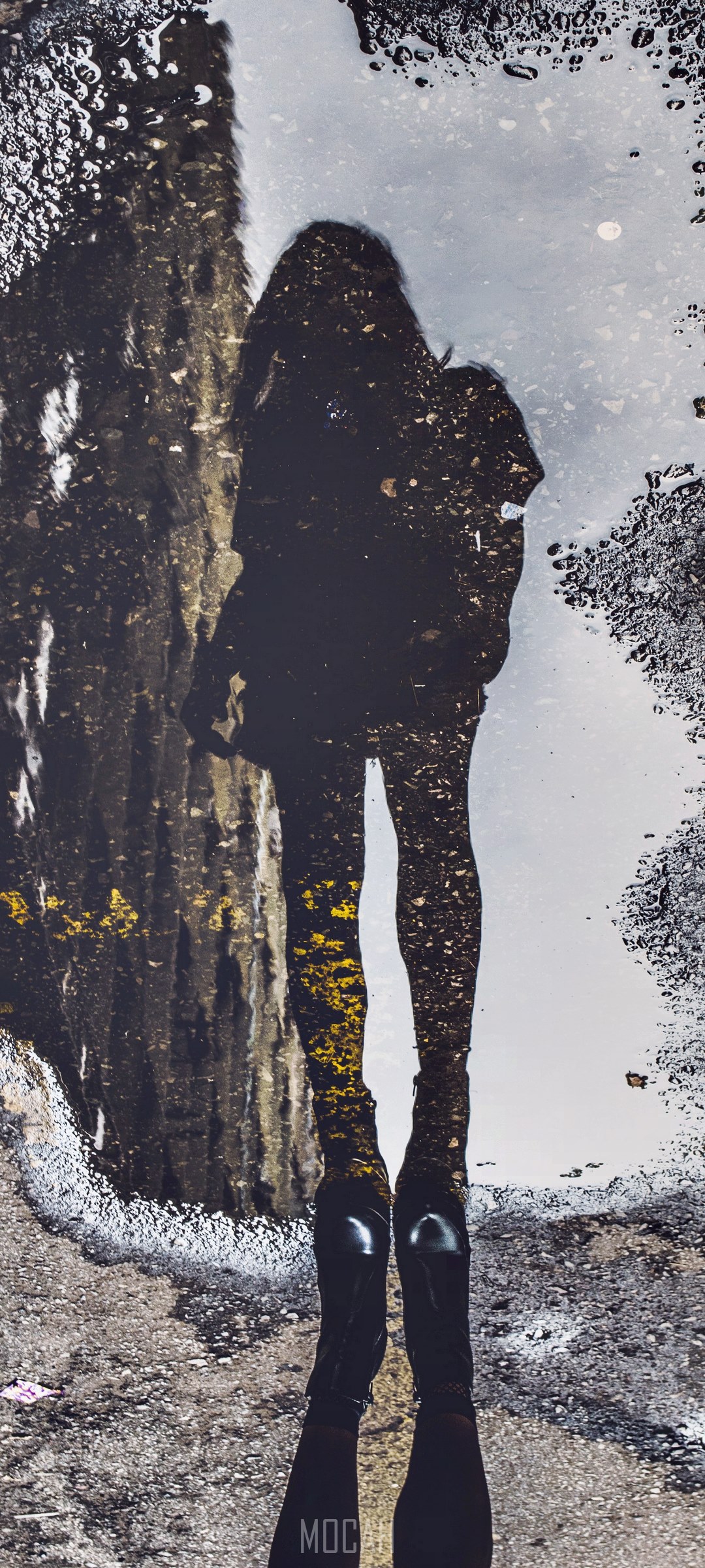 Reflection of a woman in a puddle HD Phone Wallpaper