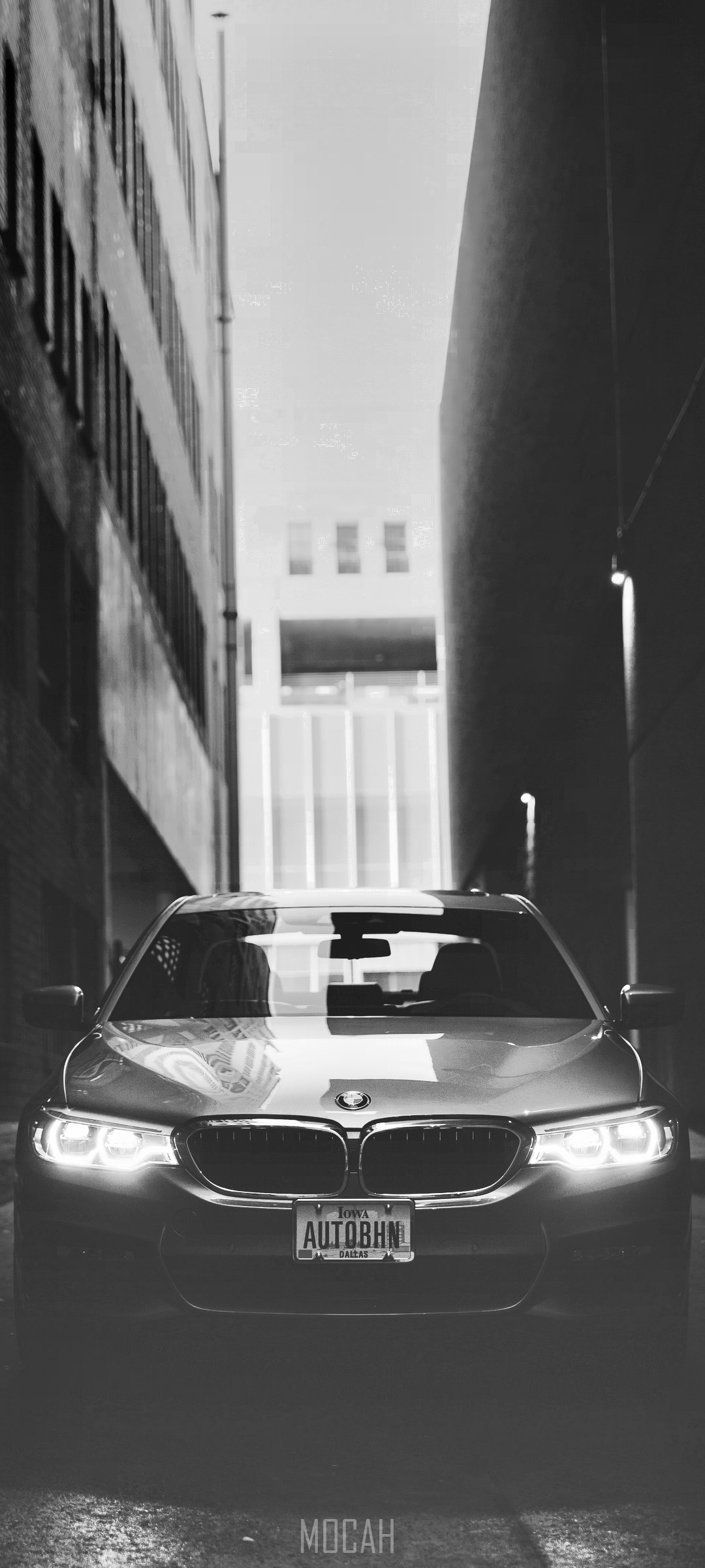 BMW 5 Series parked in an alley HD Phone Wallpaper