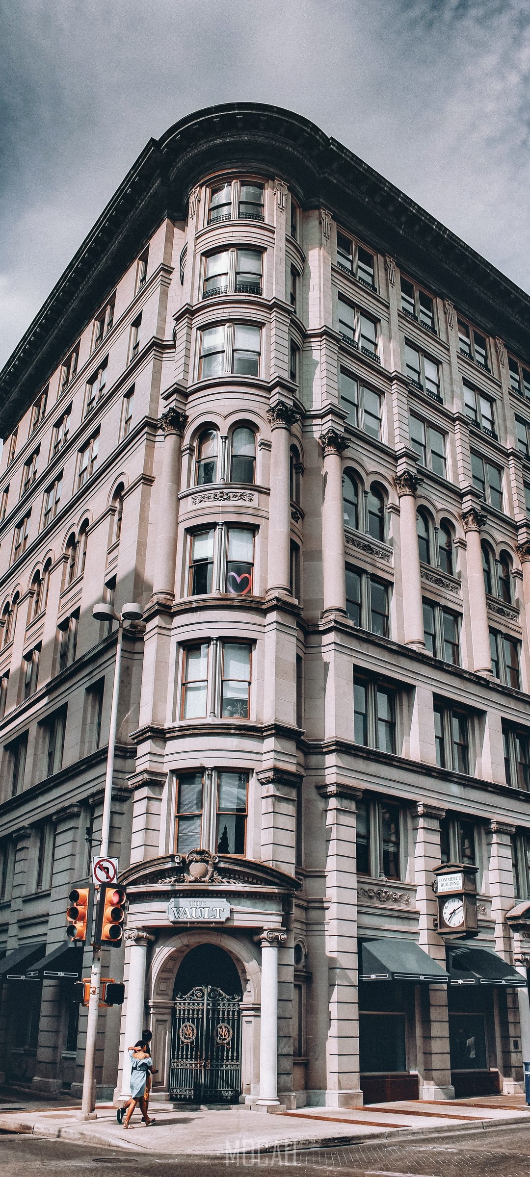 Neoclassical building facade with a heart in the window HD Phone Wallpaper