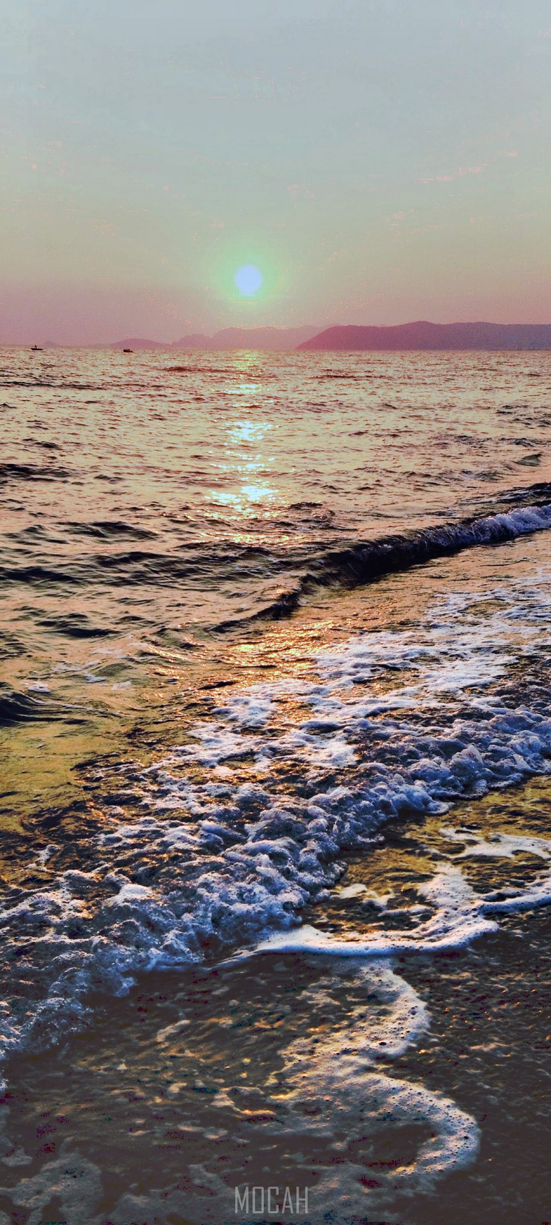 Sunset over the sea with waves on the shore HD Phone Wallpaper