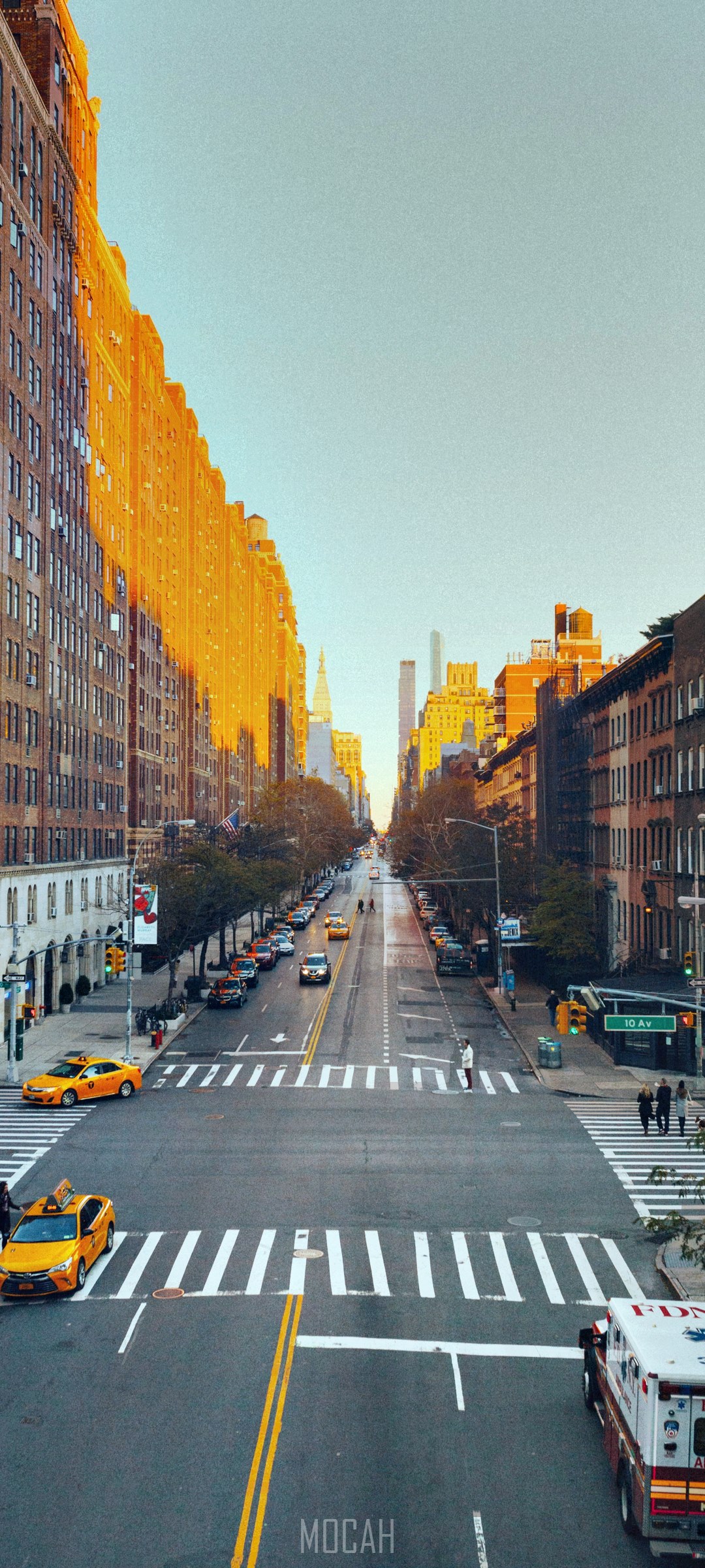New York City street with yellow cabs and buildings HD Phone Wallpaper