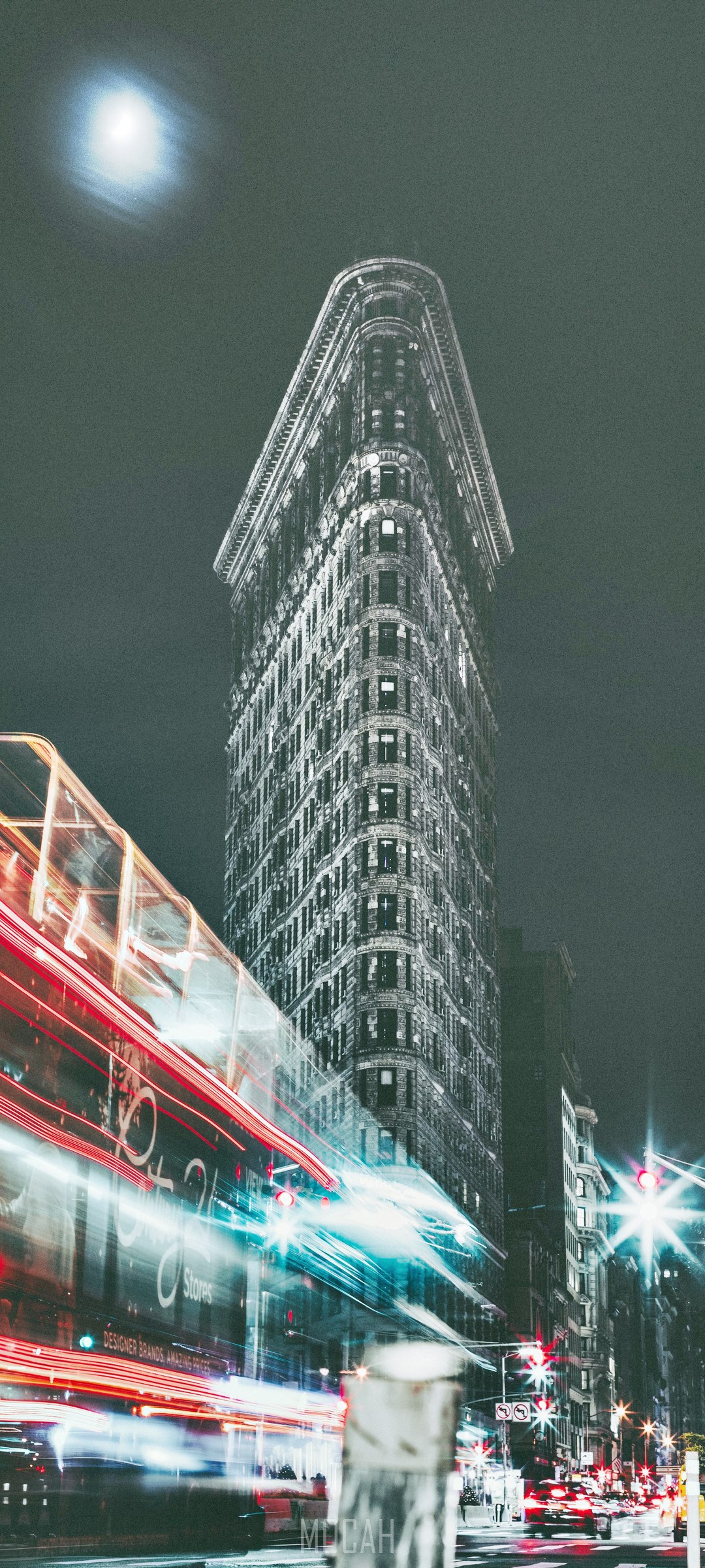 Flatiron Building at night with light trails HD Phone Wallpaper