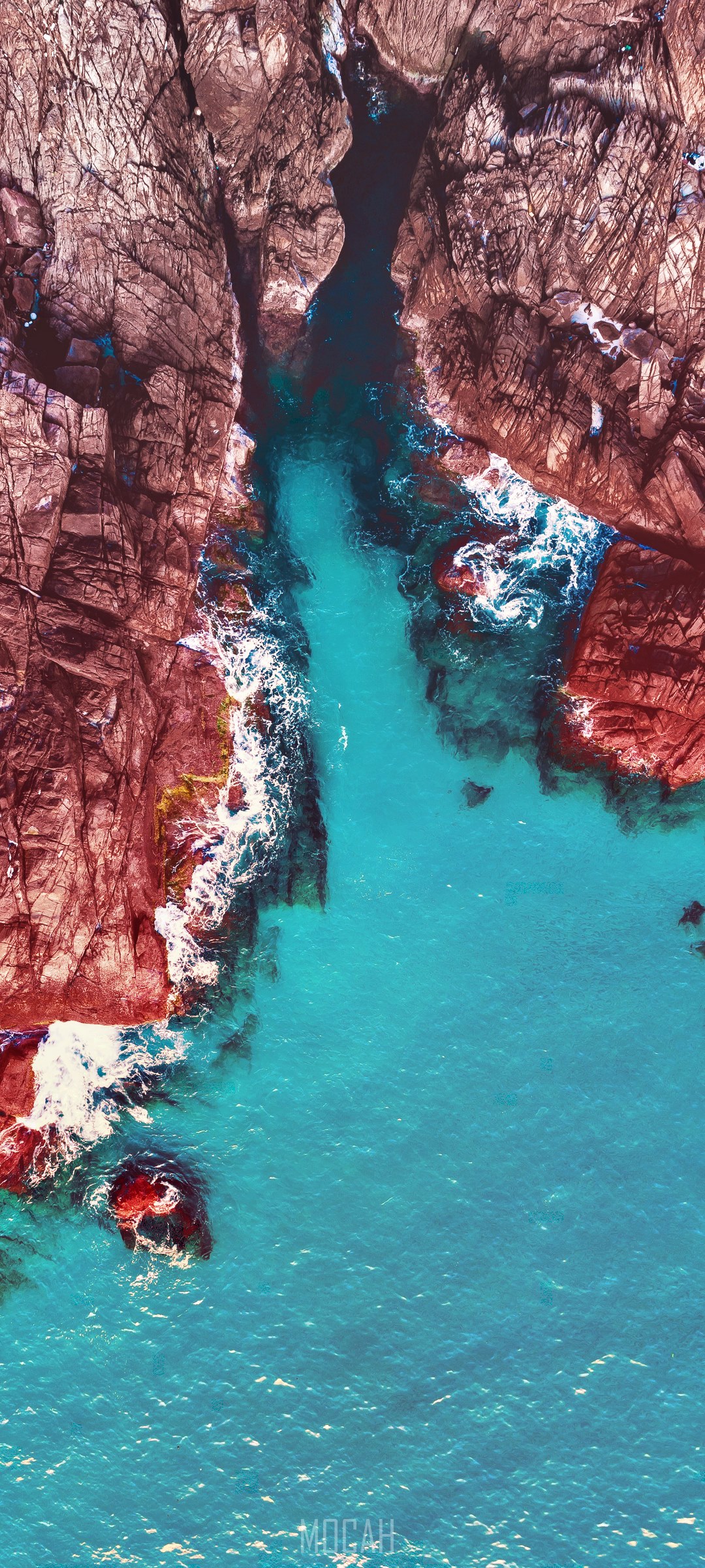Aerial view of rocky coastline and turquoise water HD Phone Wallpaper