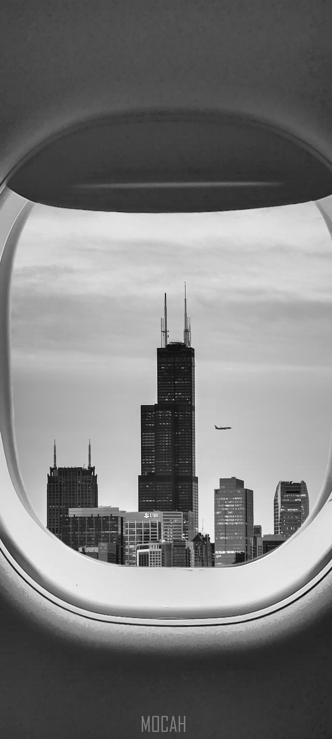 Airplane window view of Chicago skyline HD Phone Wallpaper