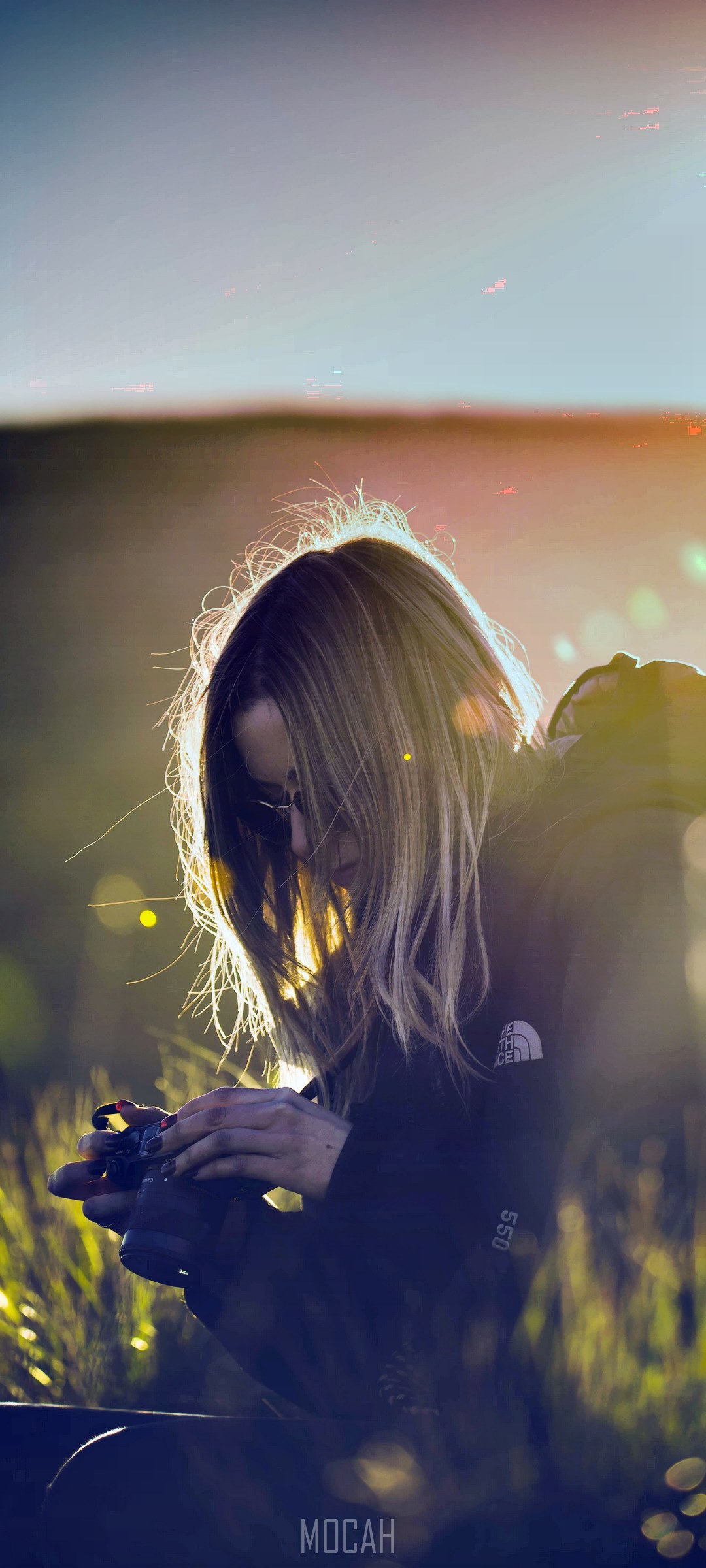 Girl with camera in backlight HD Phone Wallpaper