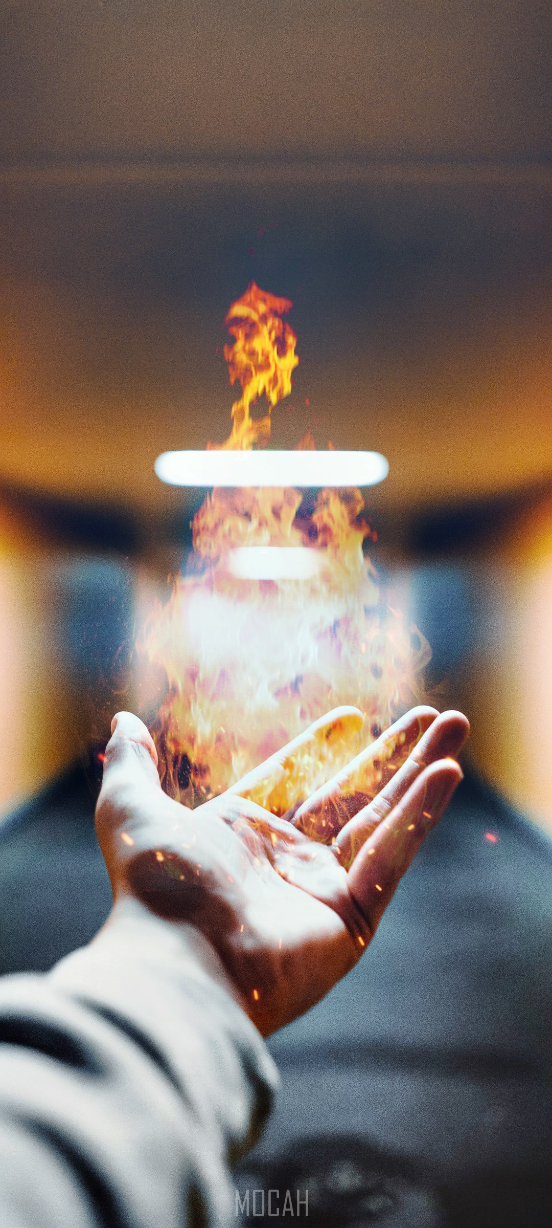 Hand conjuring fire with light in background HD Phone Wallpaper