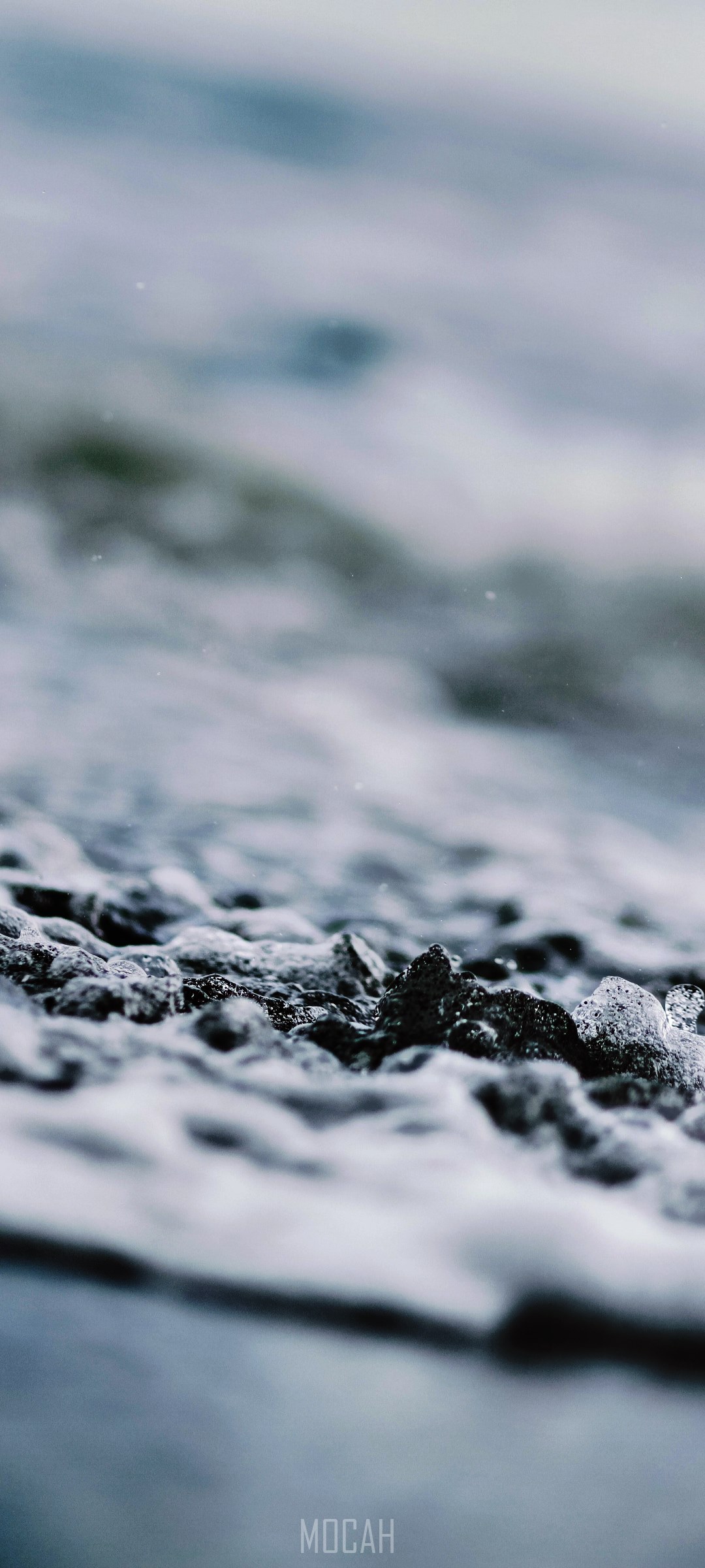 Close-up of wet pebbles and water HD Phone Wallpaper