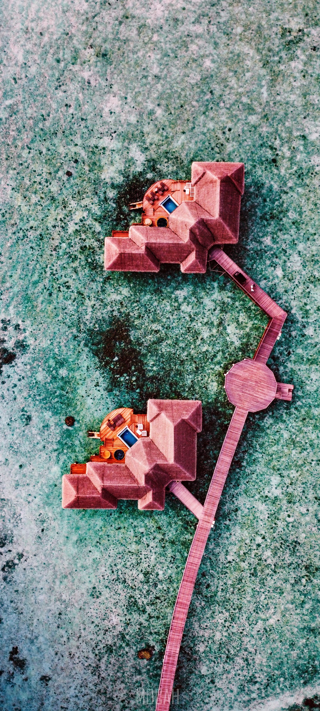 Aerial view of overwater bungalows with private pools HD Phone Wallpaper