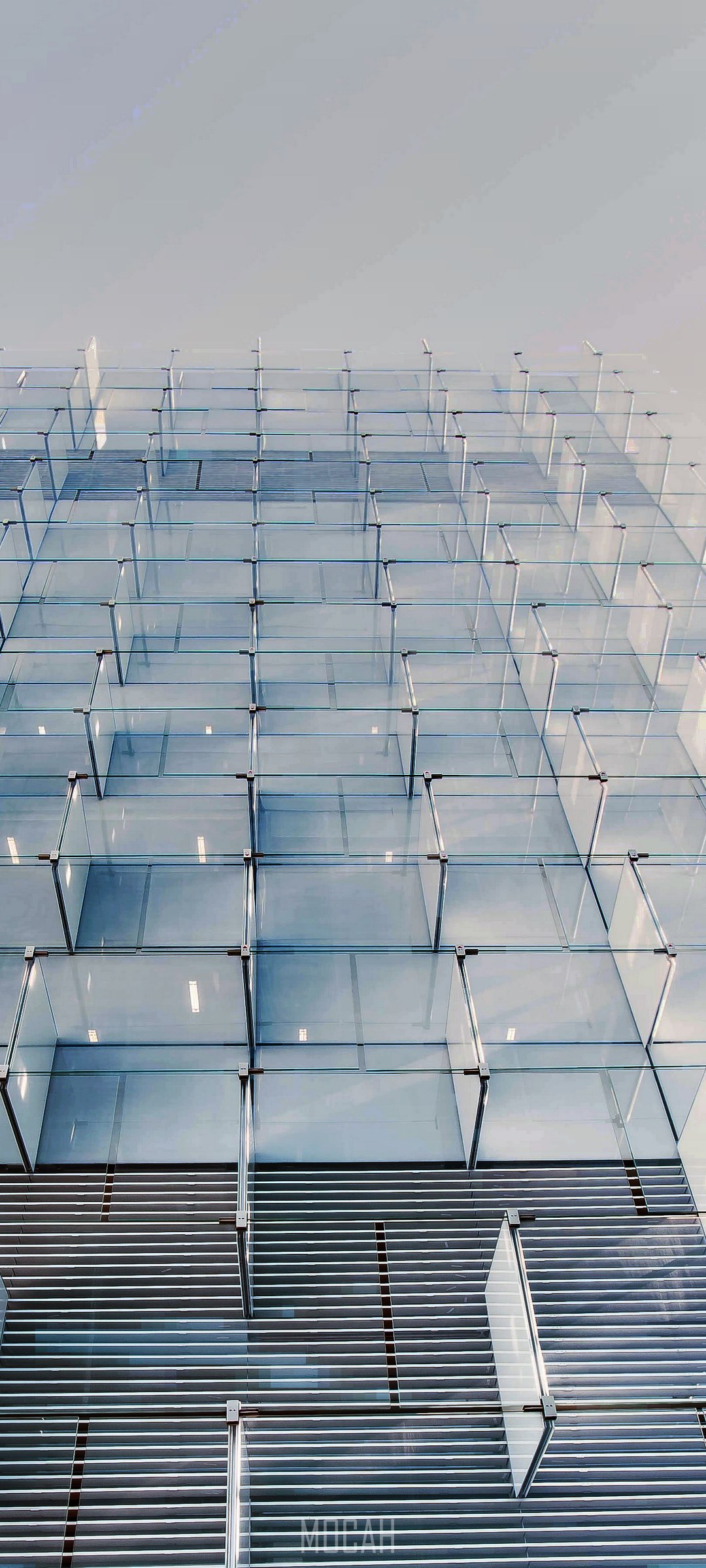 Modern glass facade of a building in Madrid HD Phone Wallpaper