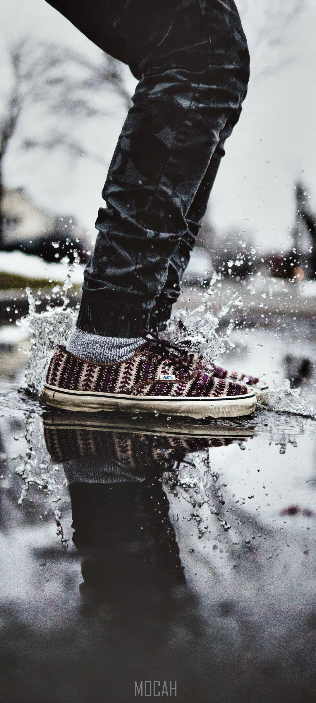 Person splashing in puddle HD Phone Wallpaper