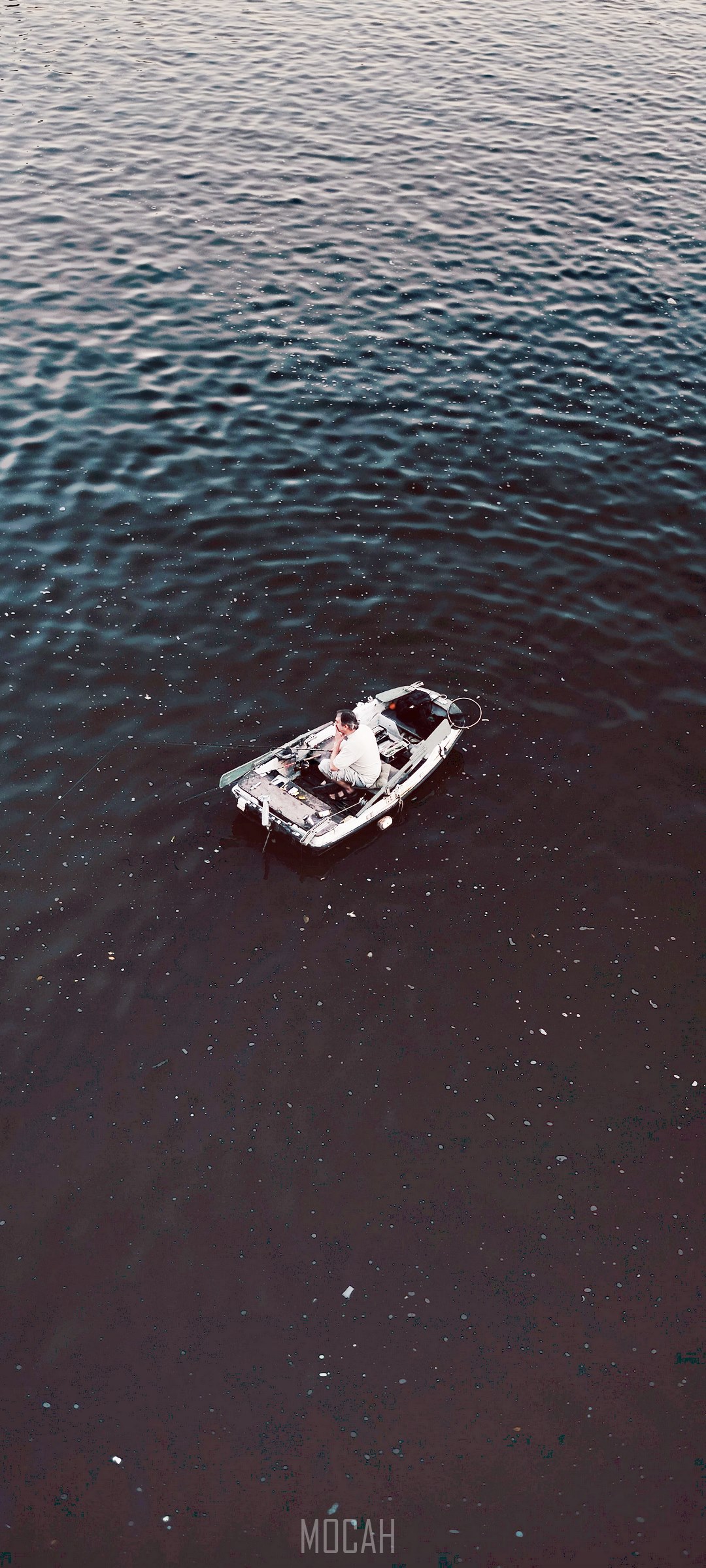 Couple in a boat on the water HD Phone Wallpaper