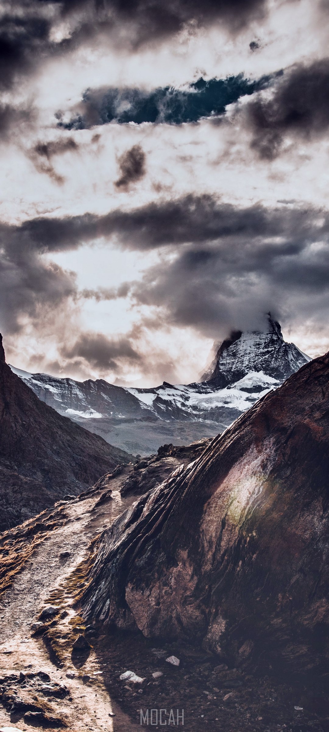 Matterhorn mountain peak under stormy clouds HD Phone Wallpaper