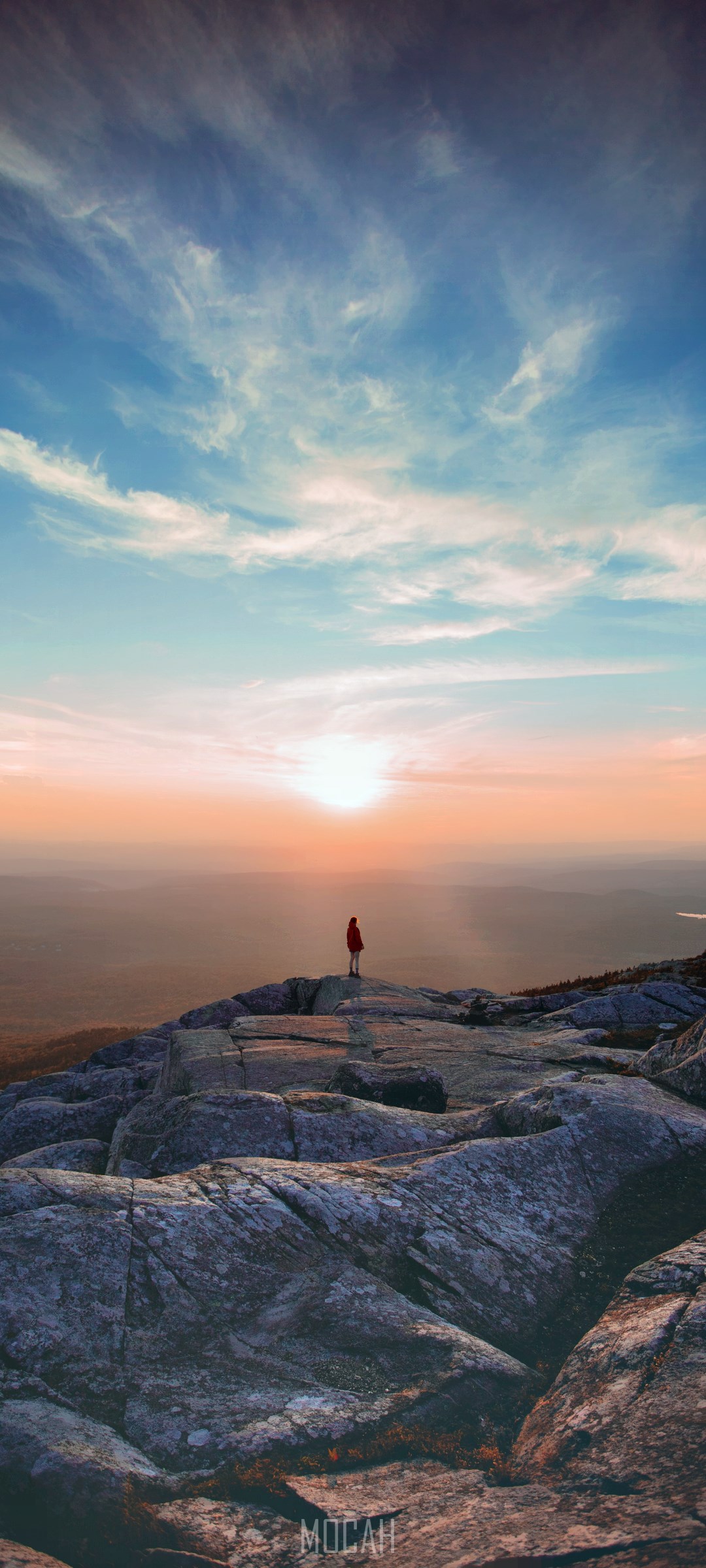 Person standing on rocky mountain at sunrise HD Phone Wallpaper