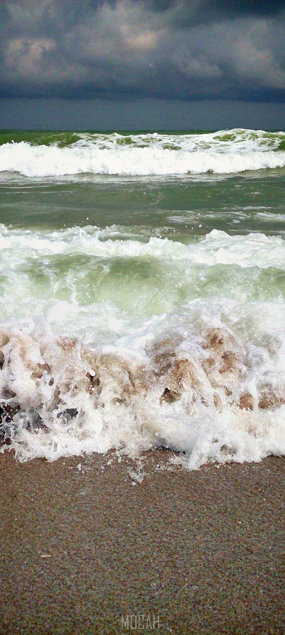 Stormy Sea Waves Crashing on Sandy Beach HD Phone Wallpaper