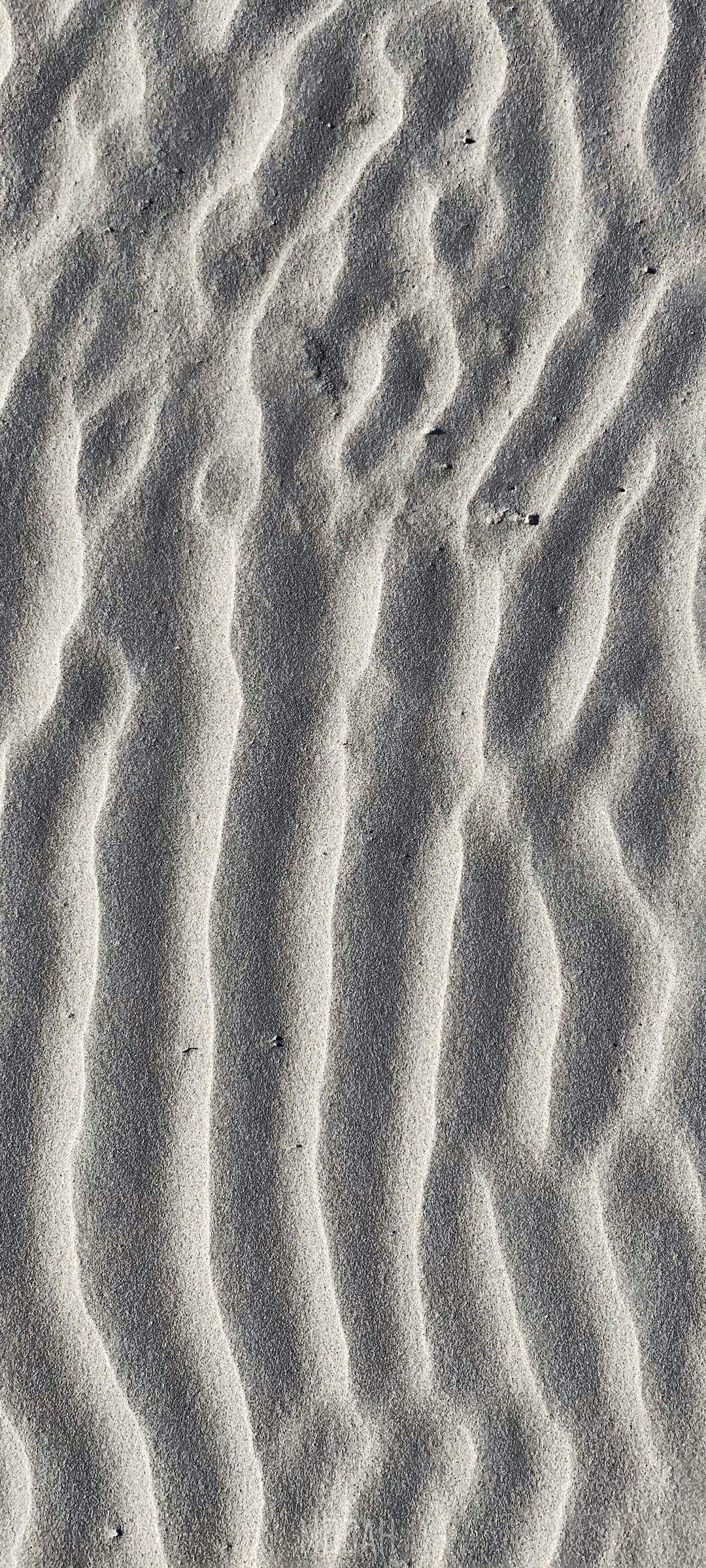 Sand ripples on a beach HD Phone Wallpaper