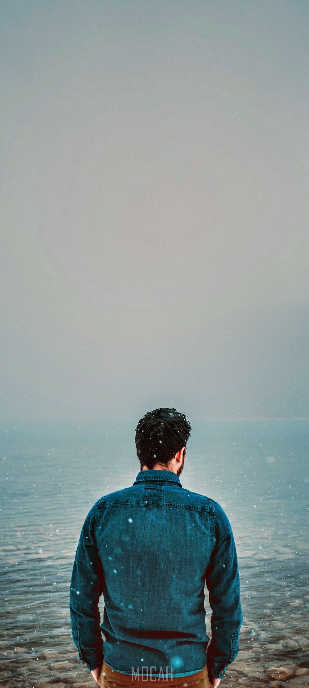 Man in denim shirt by the water HD Phone Wallpaper