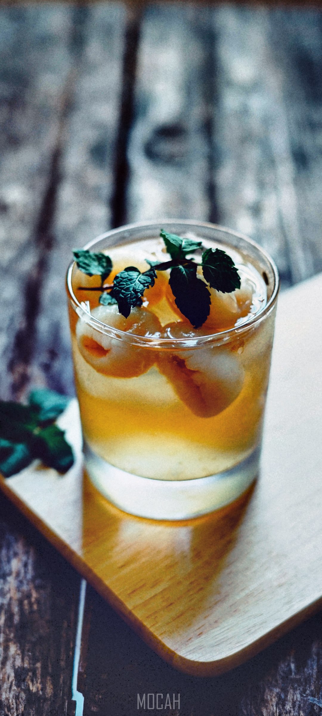 Cold cocktail with lychees and mint on a wooden board HD Phone Wallpaper