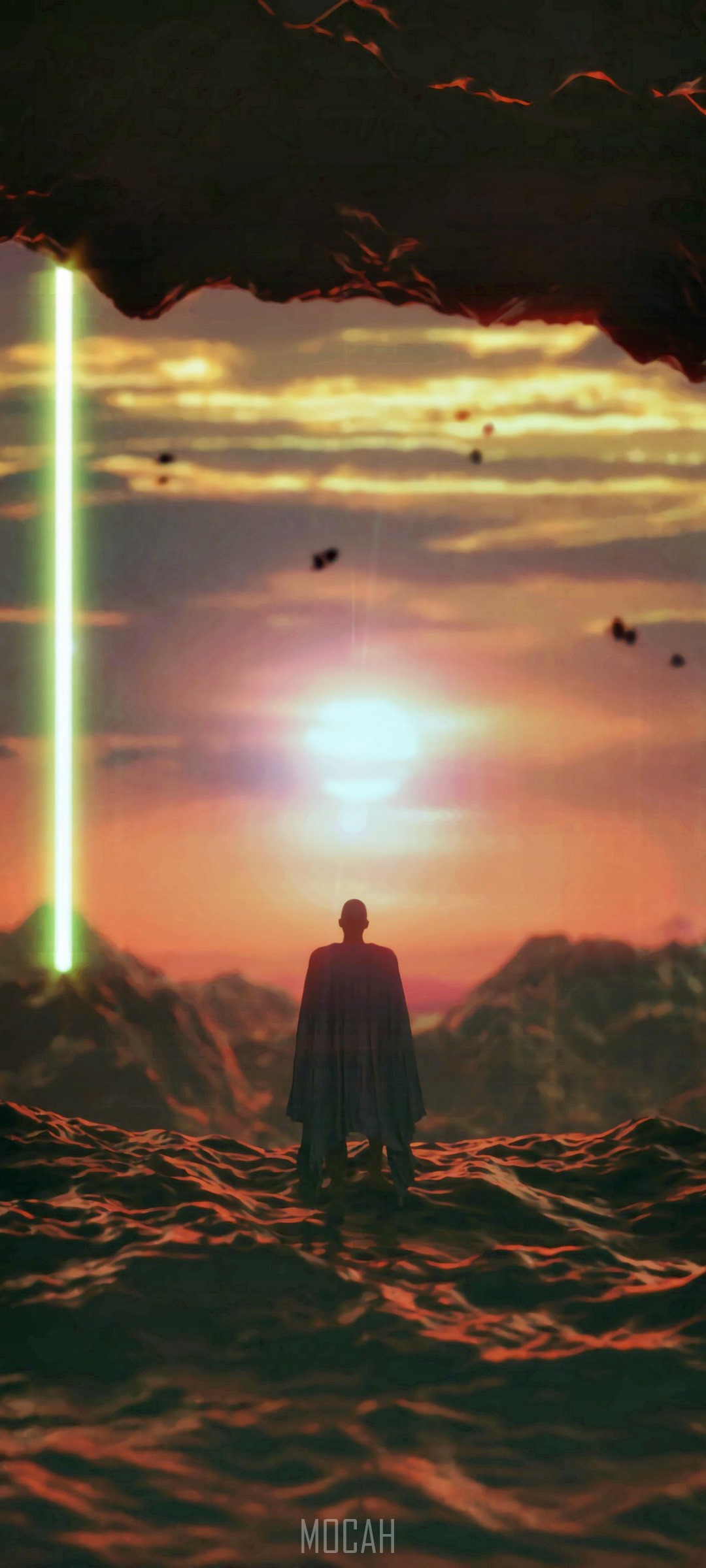 Man in cape facing sunset with light beam HD Phone Wallpaper