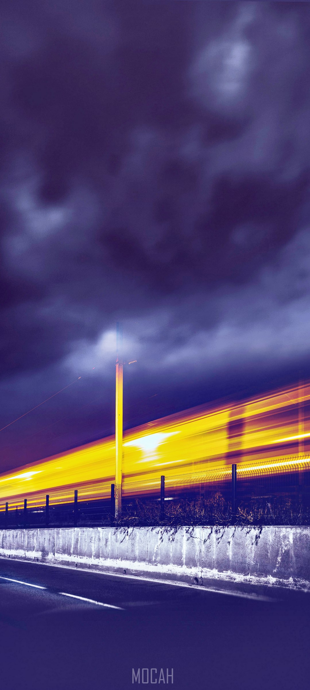 Light trails from a moving train at night HD Phone Wallpaper