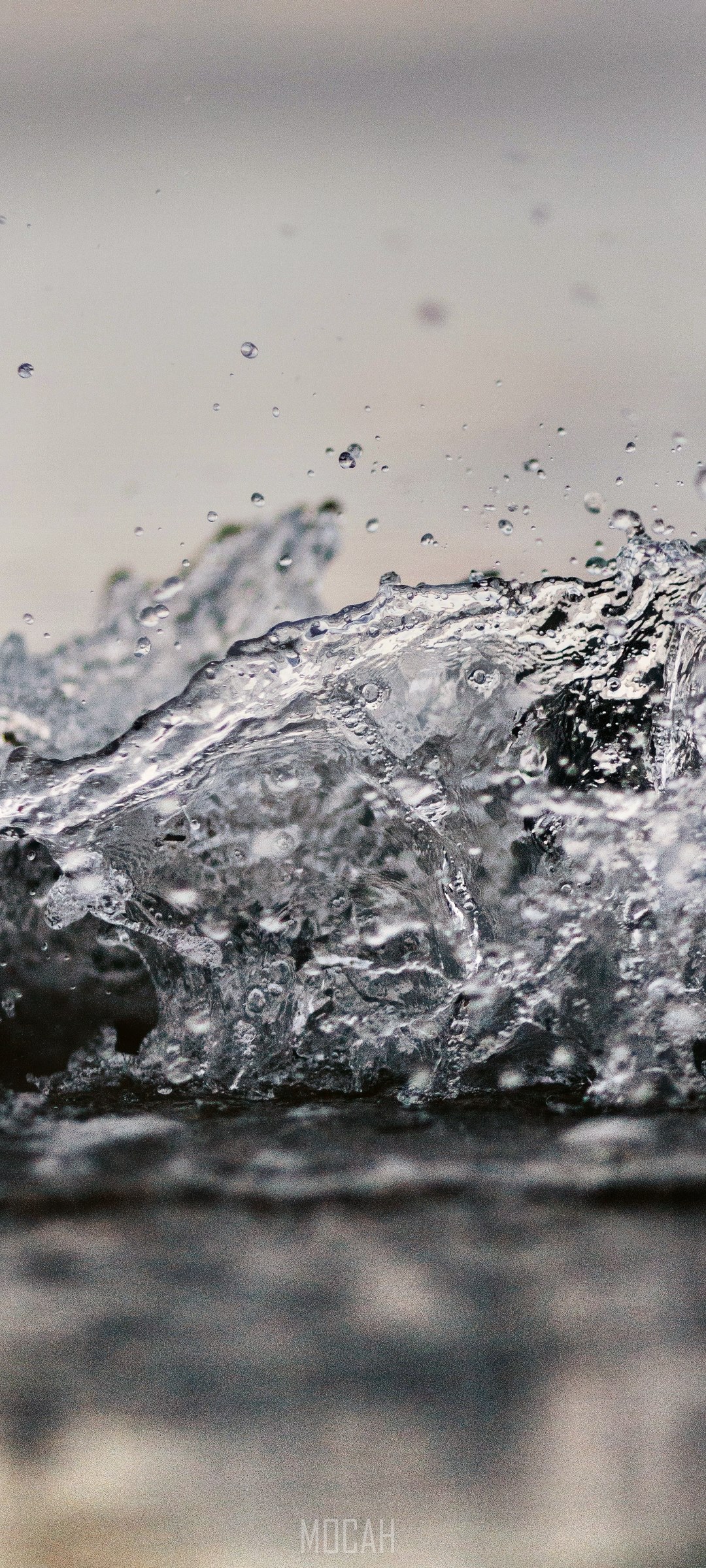 Water splash with droplets HD Phone Wallpaper