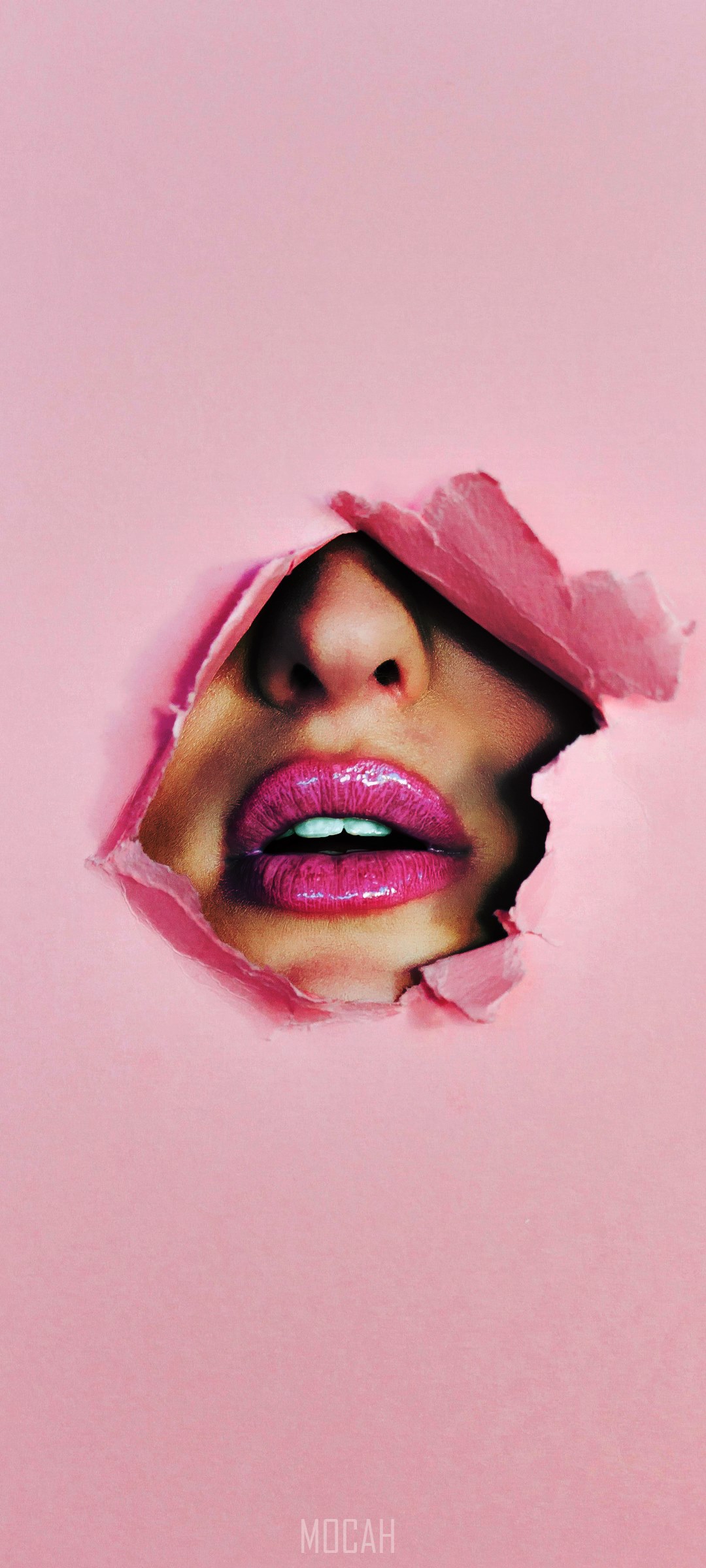 Woman's lips and nose peeking through pink paper HD Phone Wallpaper