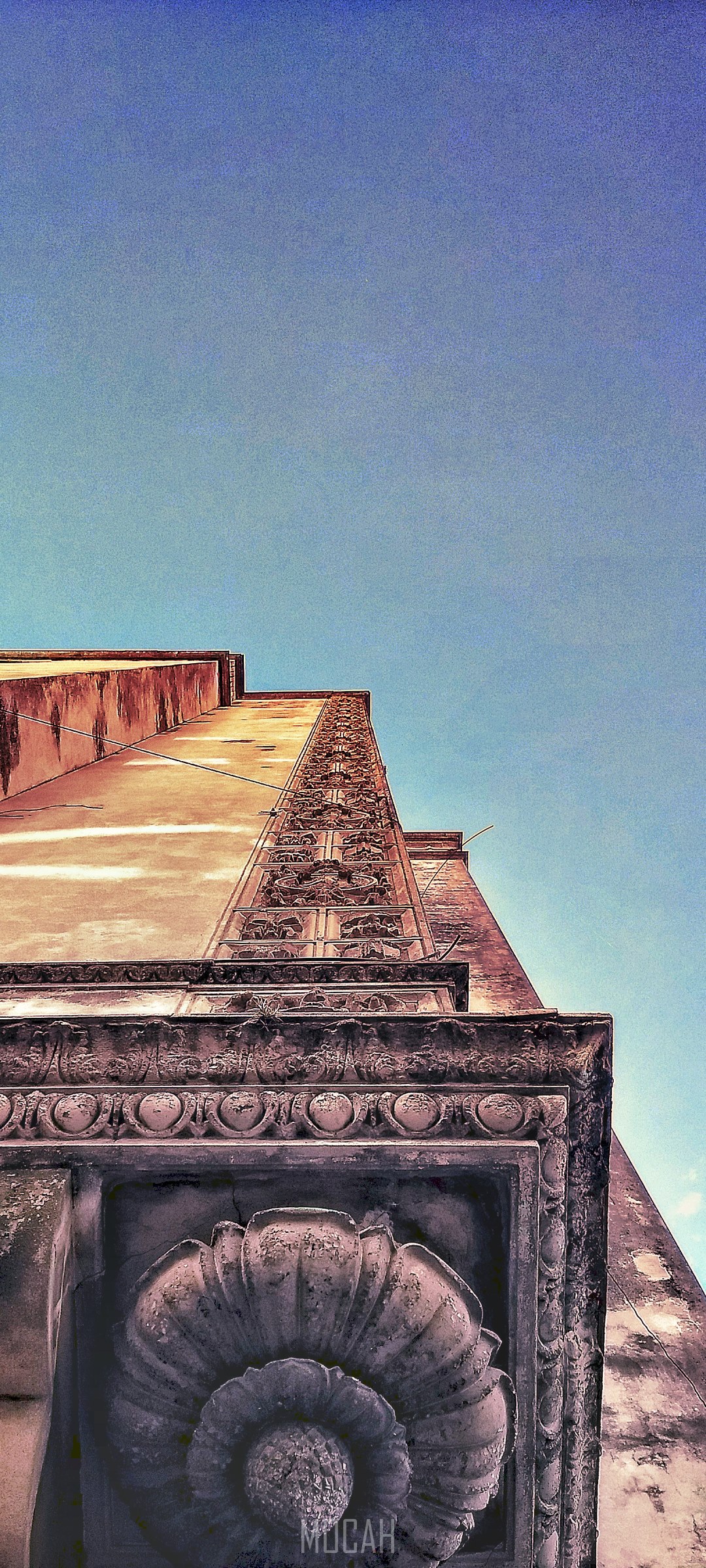 Architectural detail against a blue sky HD Phone Wallpaper