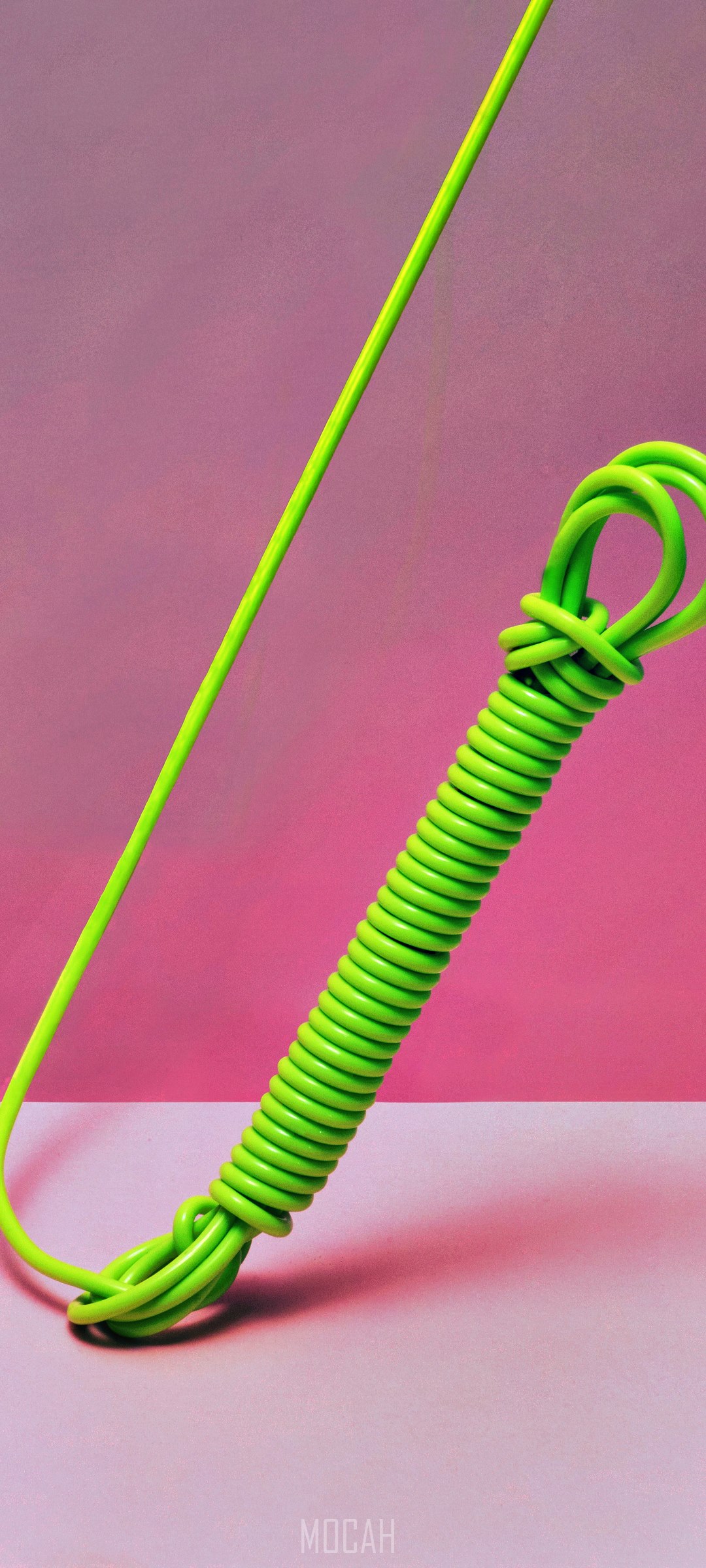 Neon green coiled rope on pink background HD Phone Wallpaper