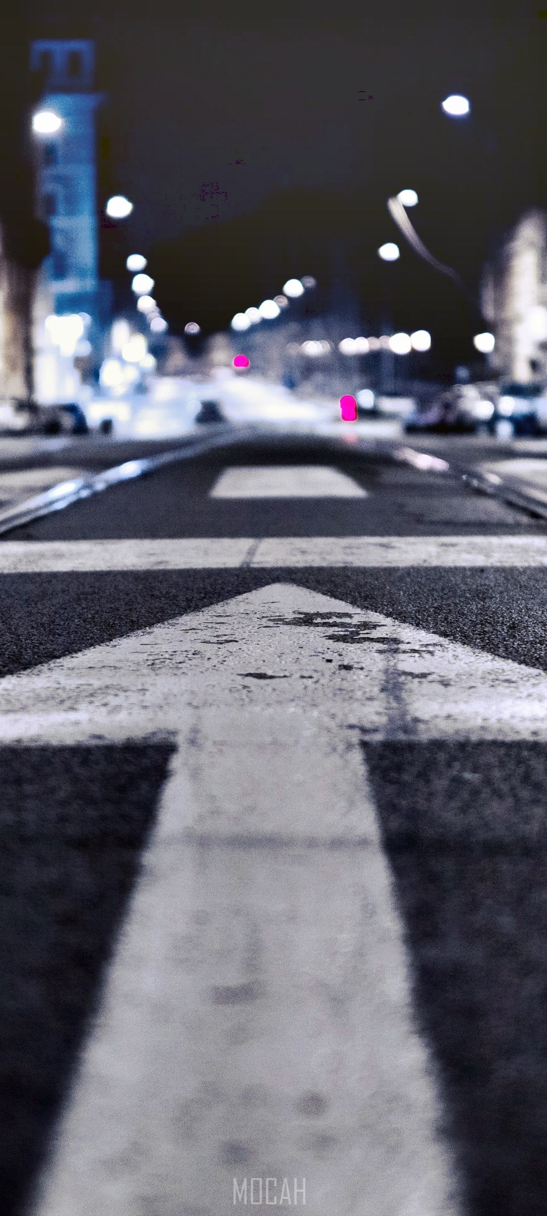 White arrow on asphalt road at night HD Phone Wallpaper