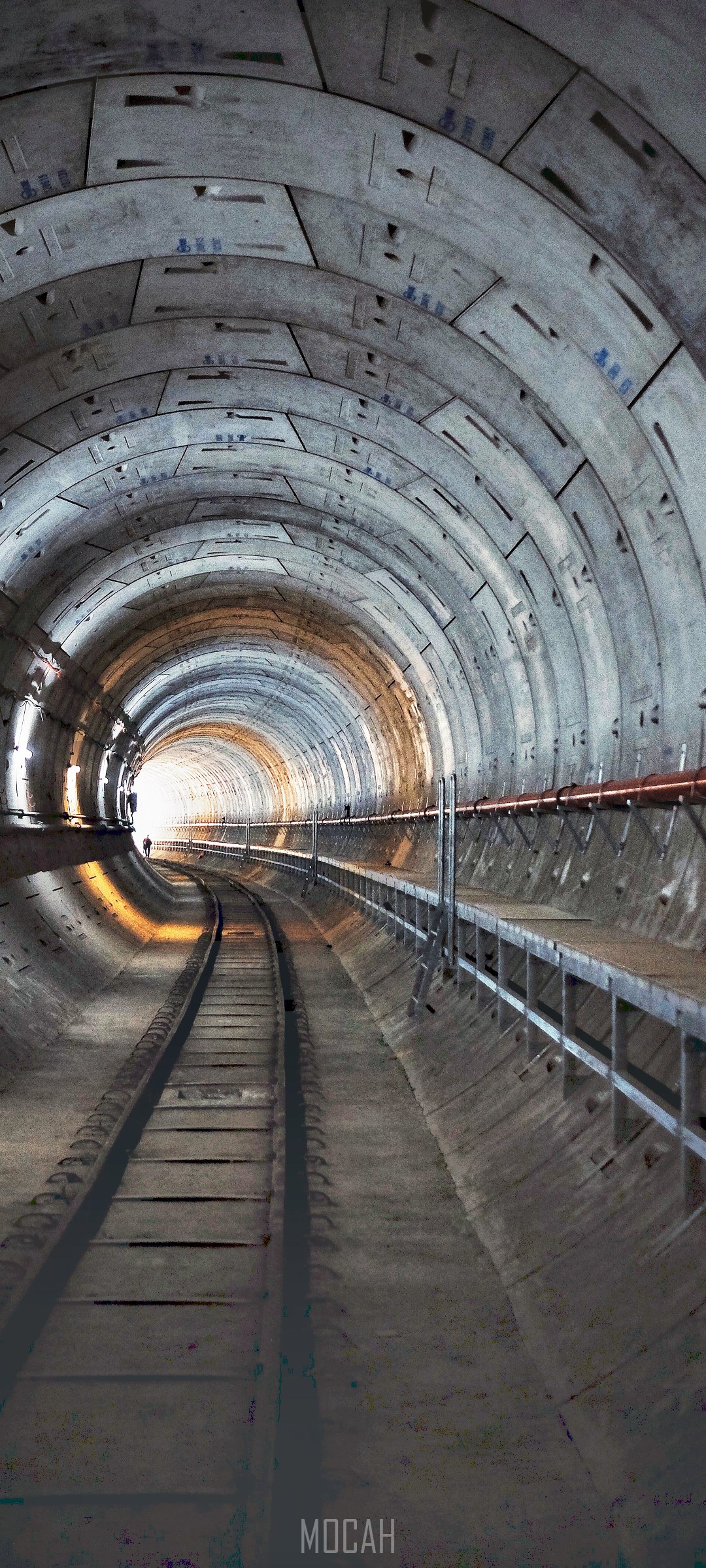 Tunnel with railroad tracks and lighting HD Phone Wallpaper