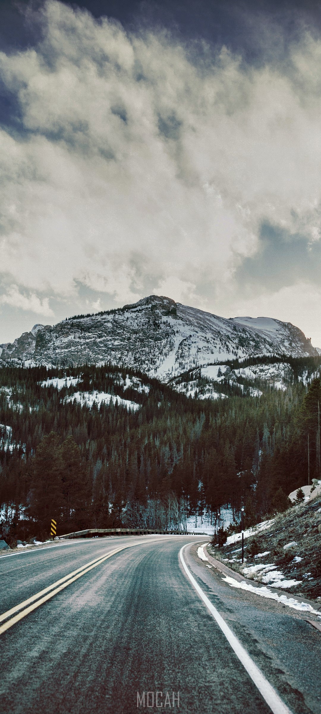 Snow-covered mountain range and road HD Phone Wallpaper