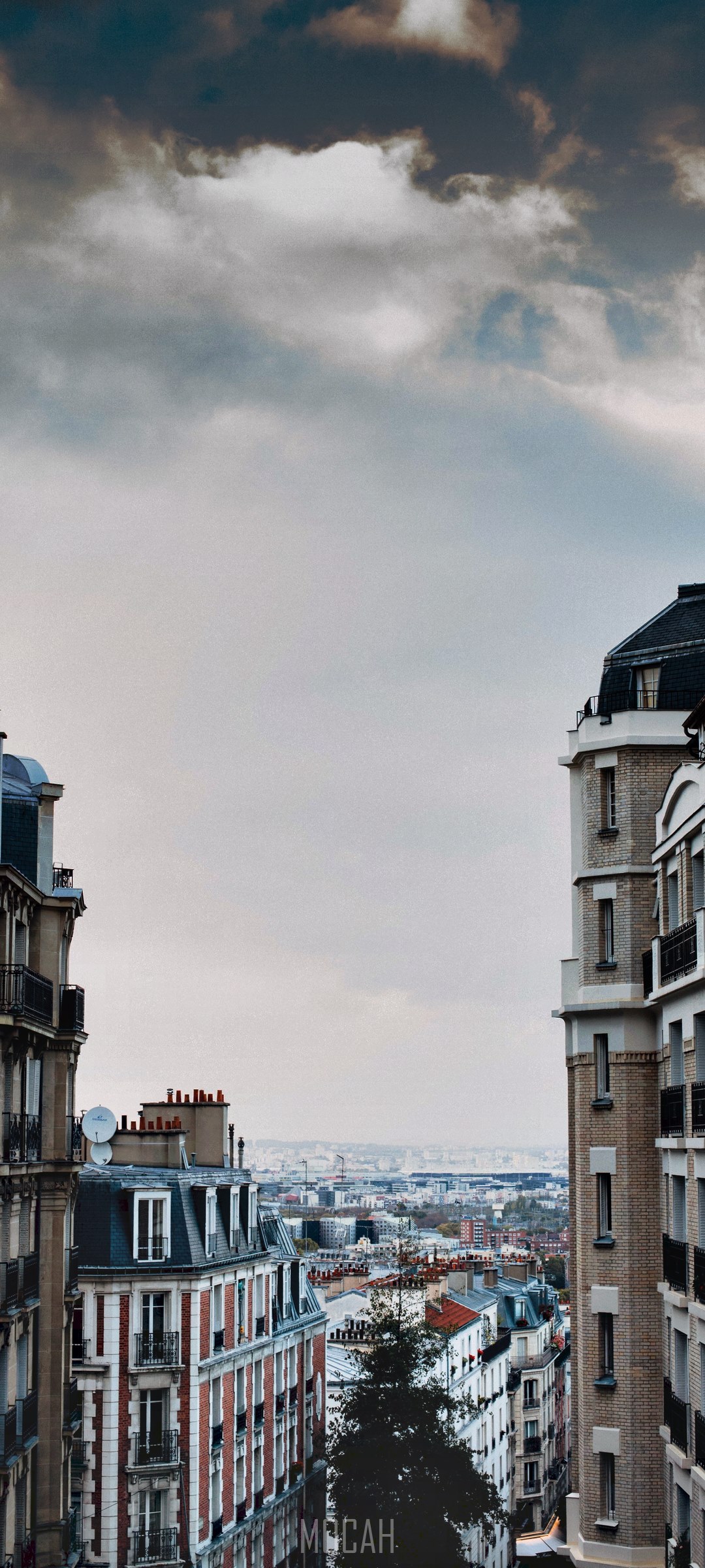 Parisian apartment buildings overlooking cityscape HD Phone Wallpaper