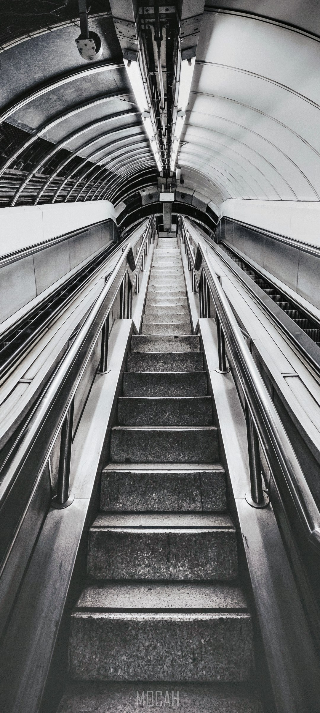 Empty escalator and stairs in a London tunnel HD Phone Wallpaper
