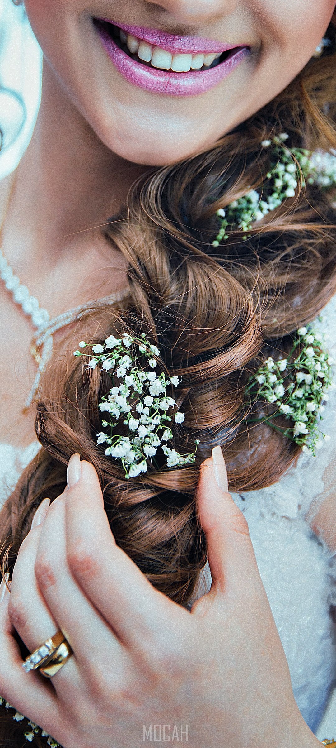 Bride with flowers in braided hair and diamond necklace HD Phone Wallpaper