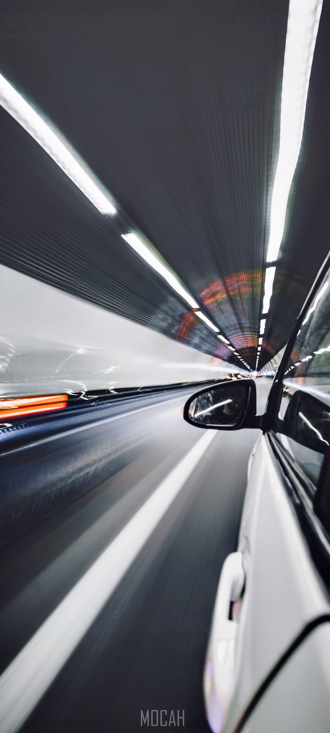 Long exposure photo of a white car in a tunnel HD Phone Wallpaper
