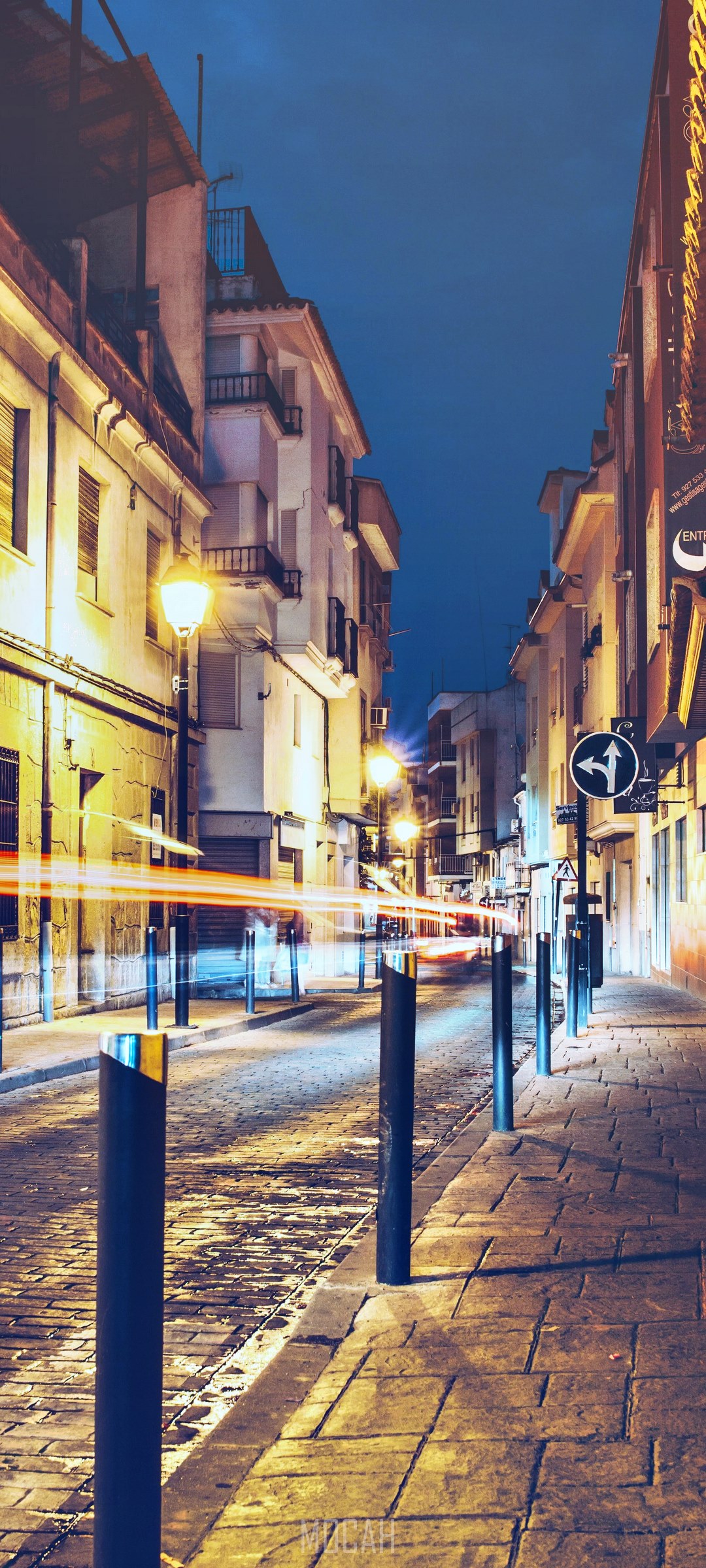 Street at night with light trails and historic architecture HD Phone Wallpaper