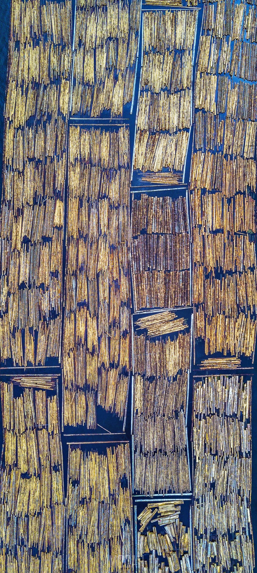 Aerial view of bamboo rafts on a river HD Phone Wallpaper