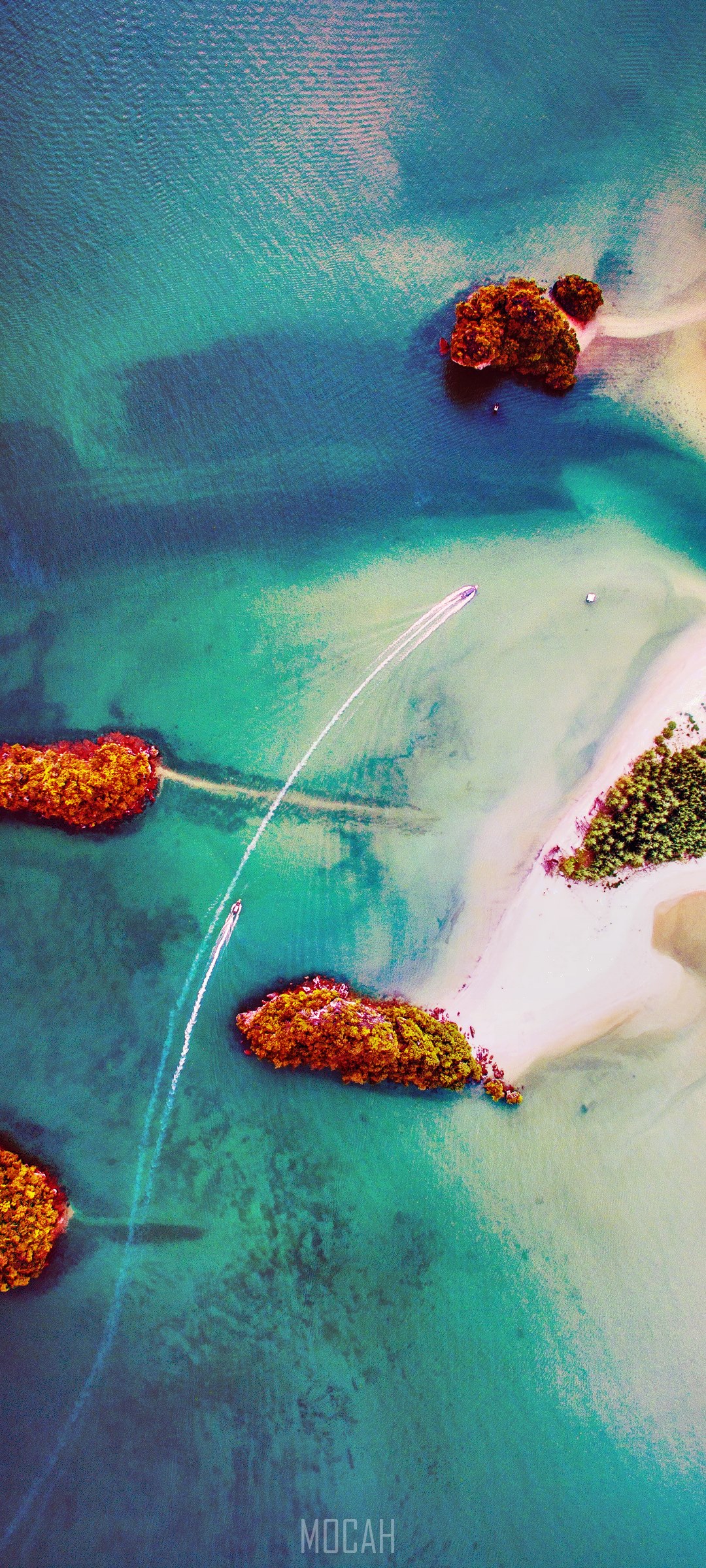Aerial view of boats speeding between tropical islands HD Phone Wallpaper