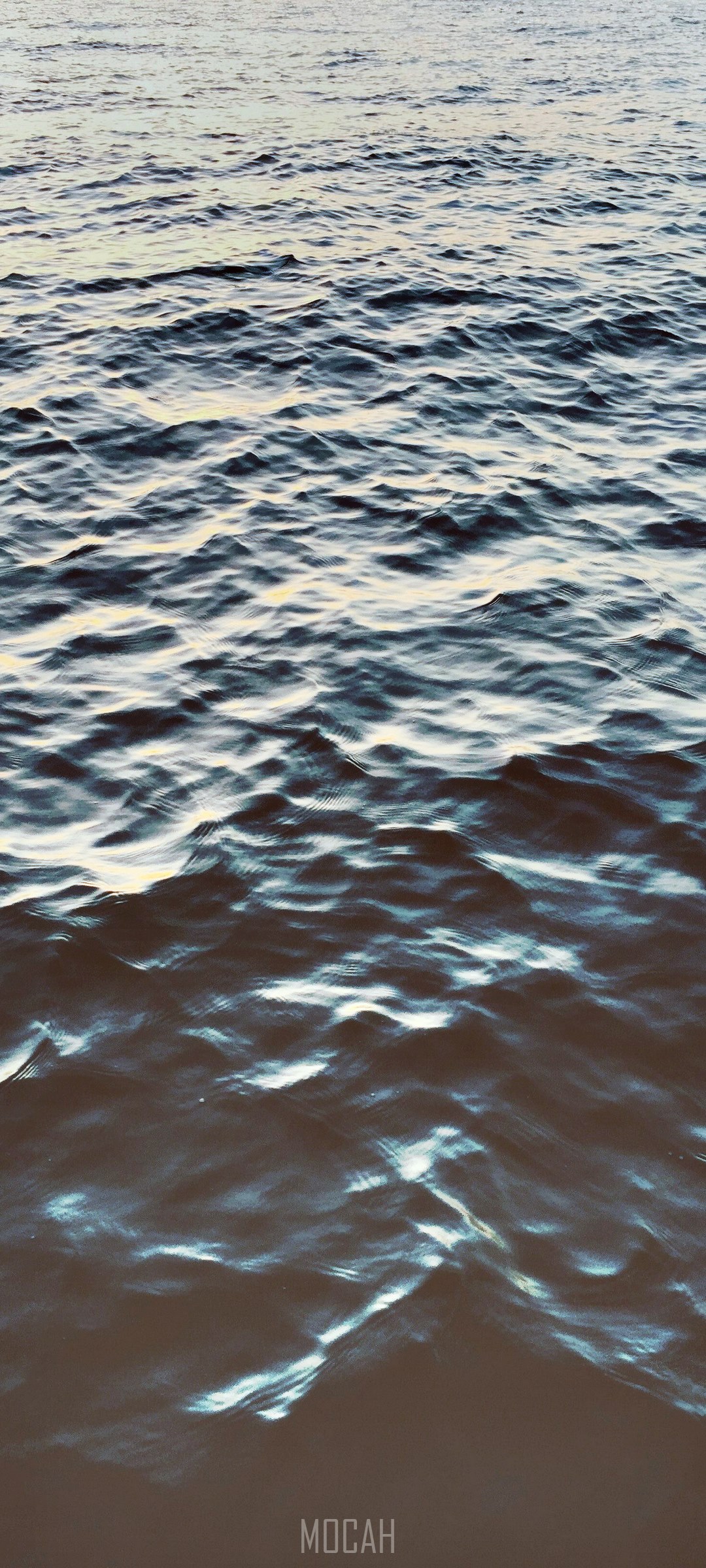 Water surface with light reflections HD Phone Wallpaper