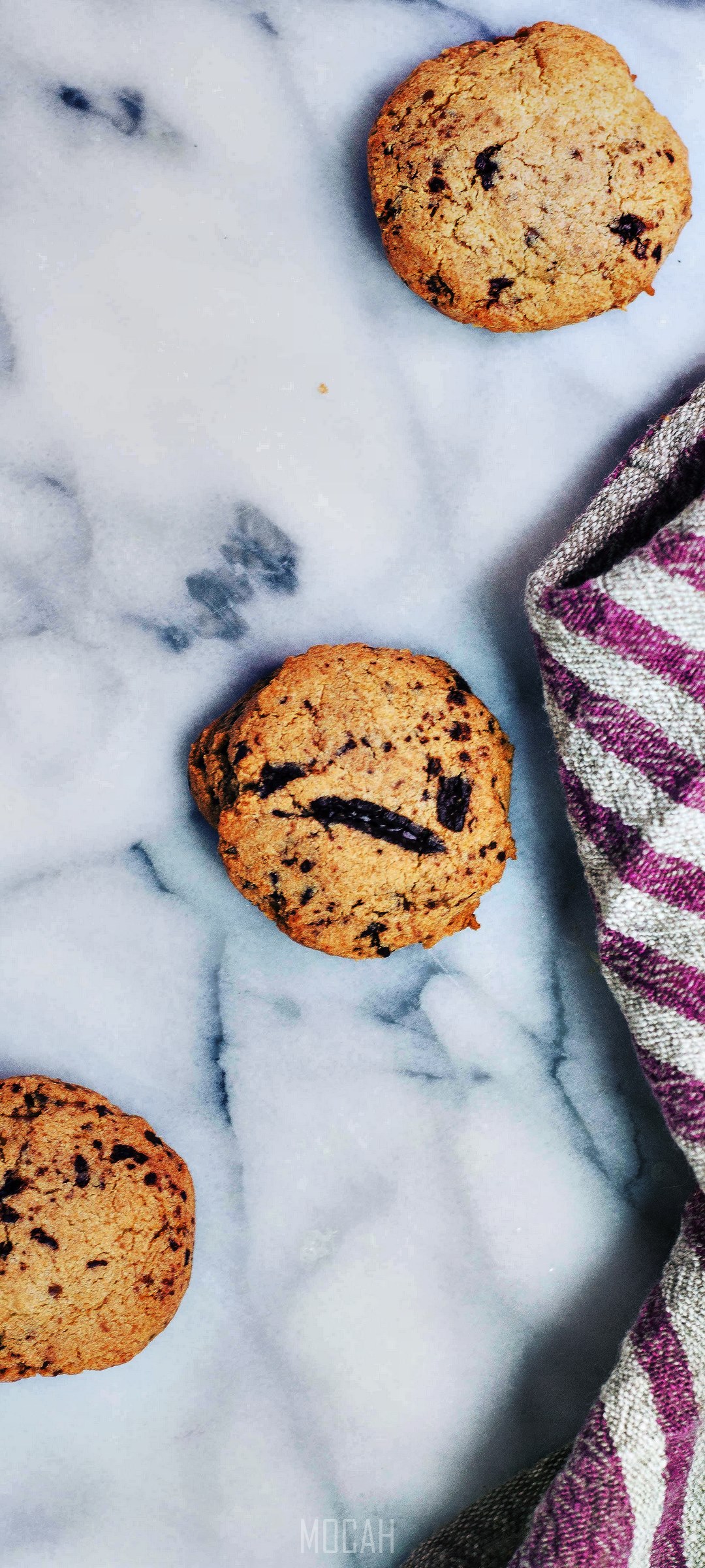 Chocolate chip cookies on a marble surface HD Phone Wallpaper