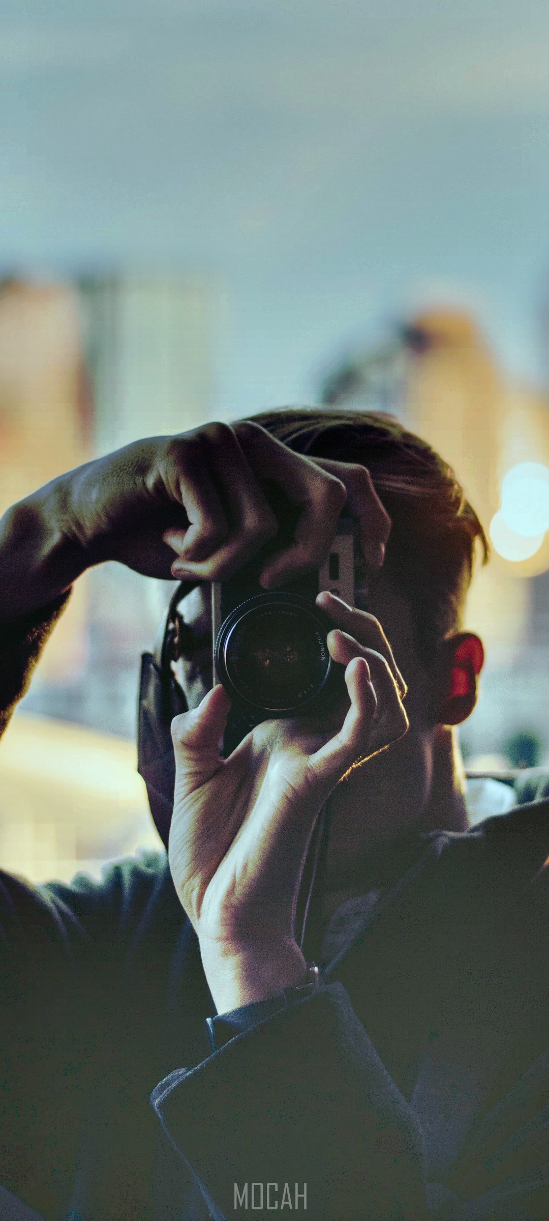 Man taking a selfie with a camera HD Phone Wallpaper