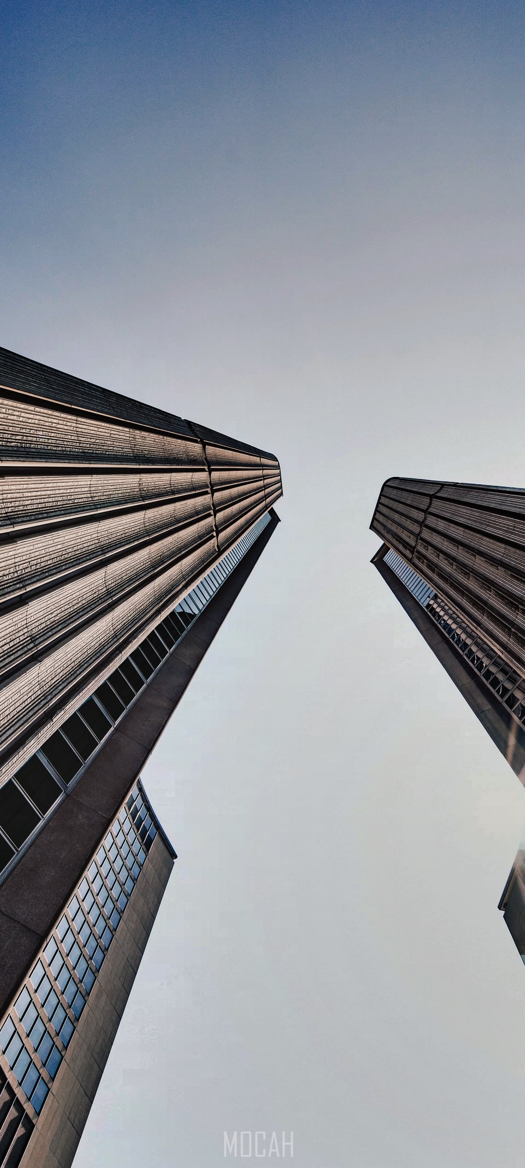 Modern architecture, skyscrapers against a clear sky HD Phone Wallpaper