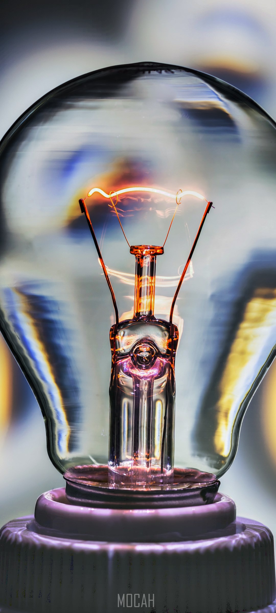 Close-up of a lit incandescent light bulb HD Phone Wallpaper