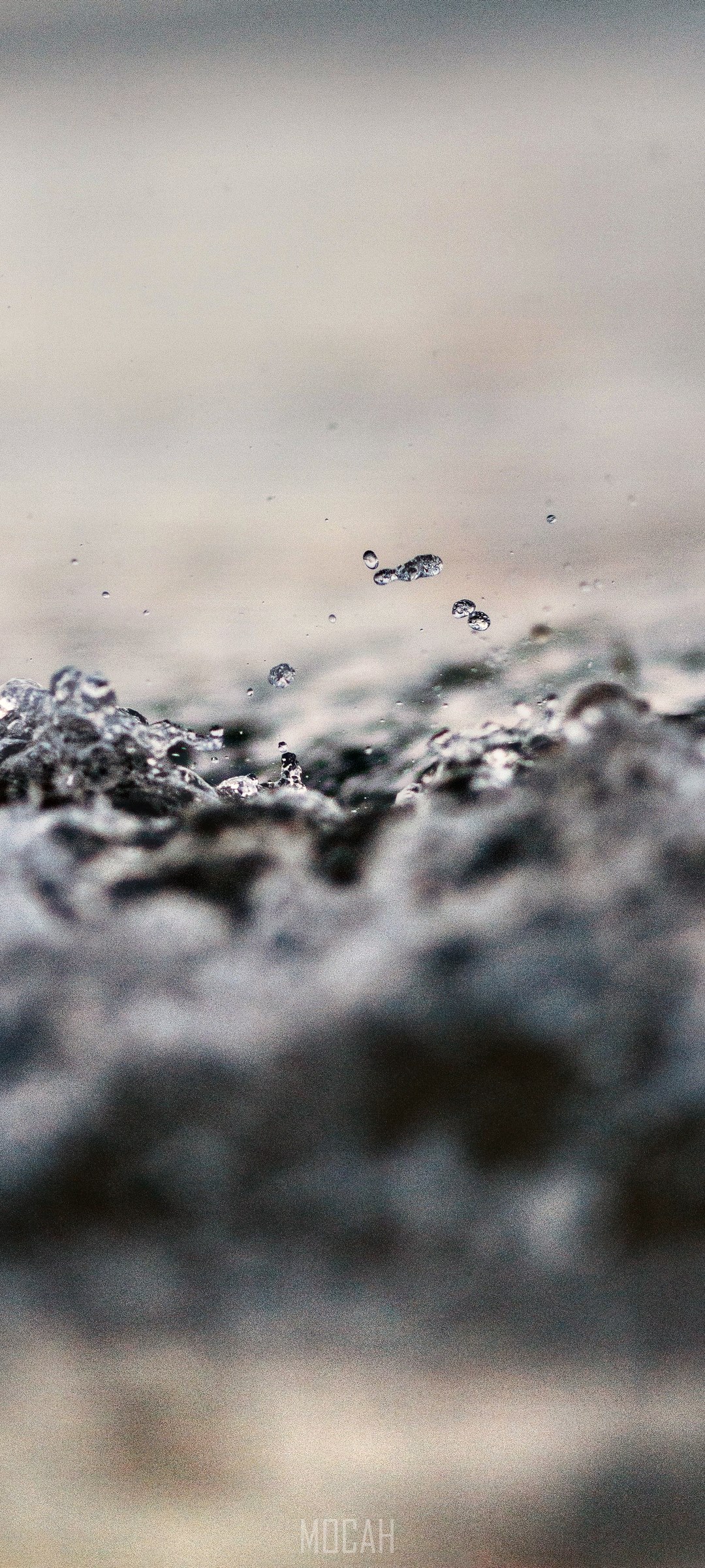 Close-up of water splashing with tiny droplets HD Phone Wallpaper