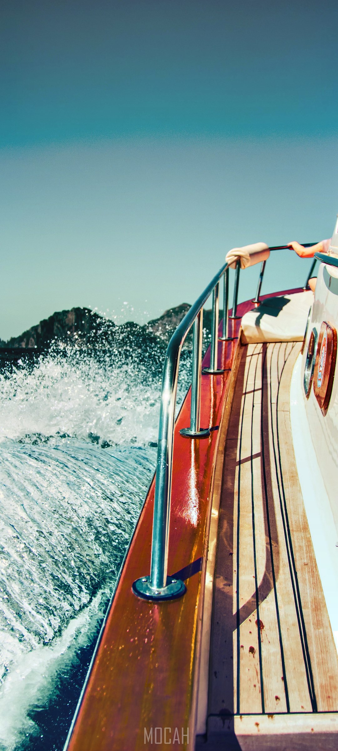 Boat ride with mountains and ocean spray HD Phone Wallpaper