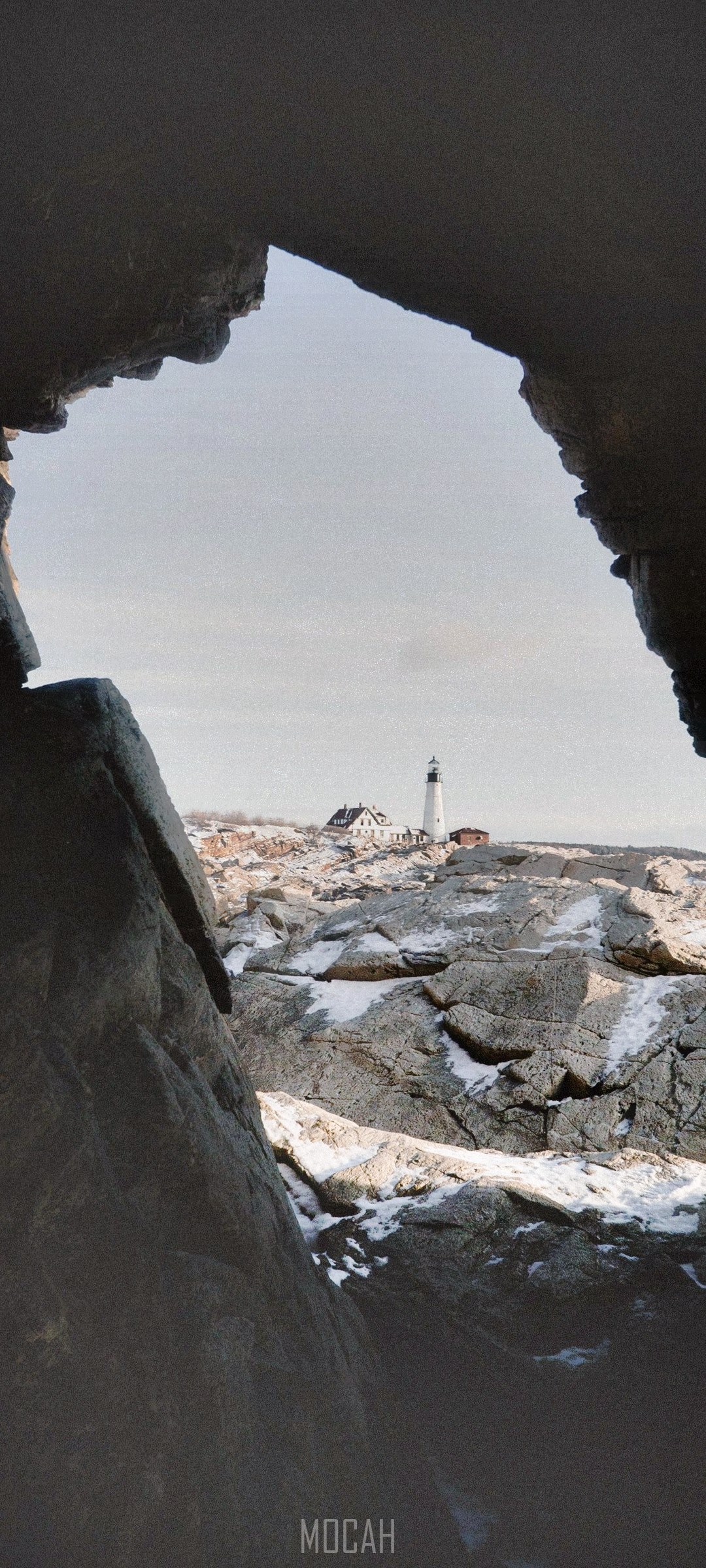 Portland Head Light Lighthouse through rock formation HD Phone Wallpaper