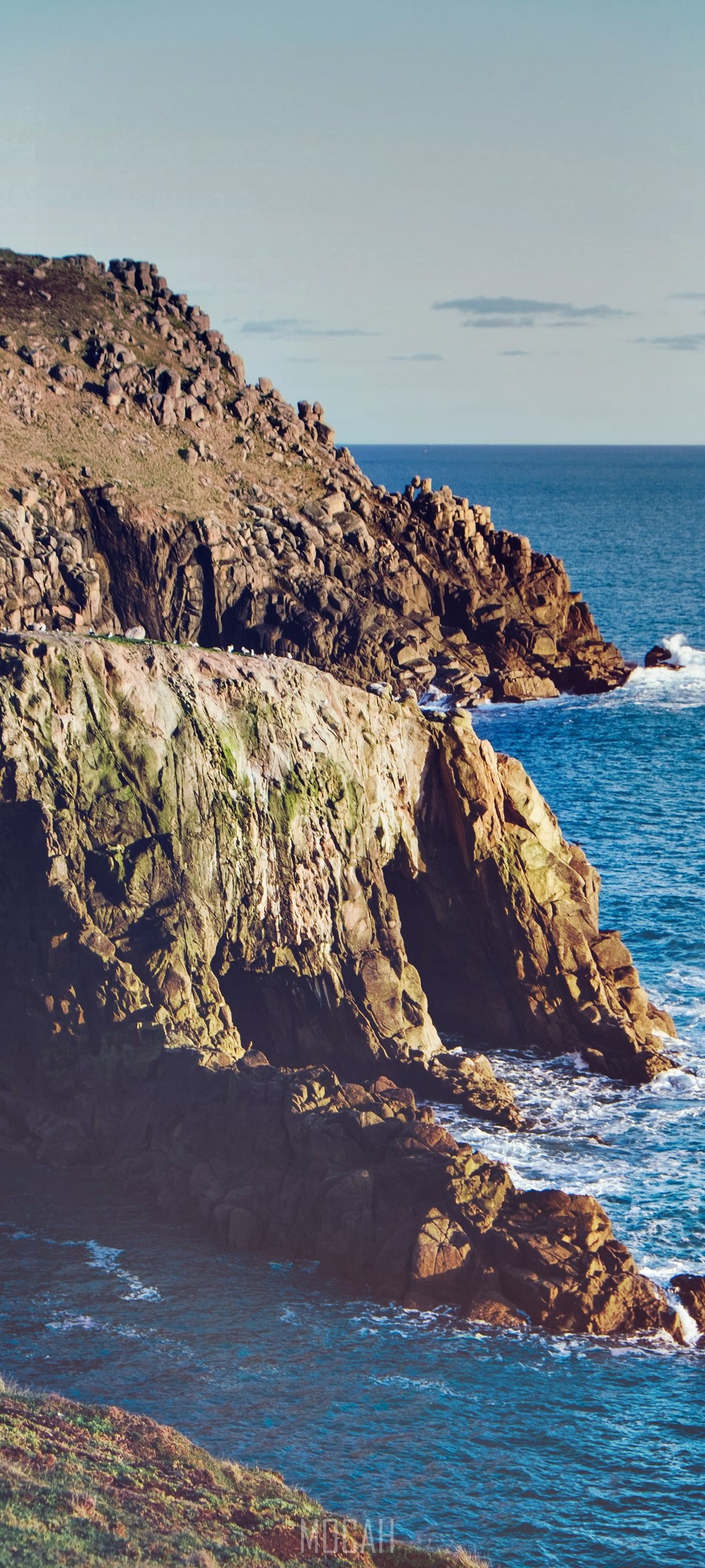 Rocky coastline with blue ocean HD Phone Wallpaper