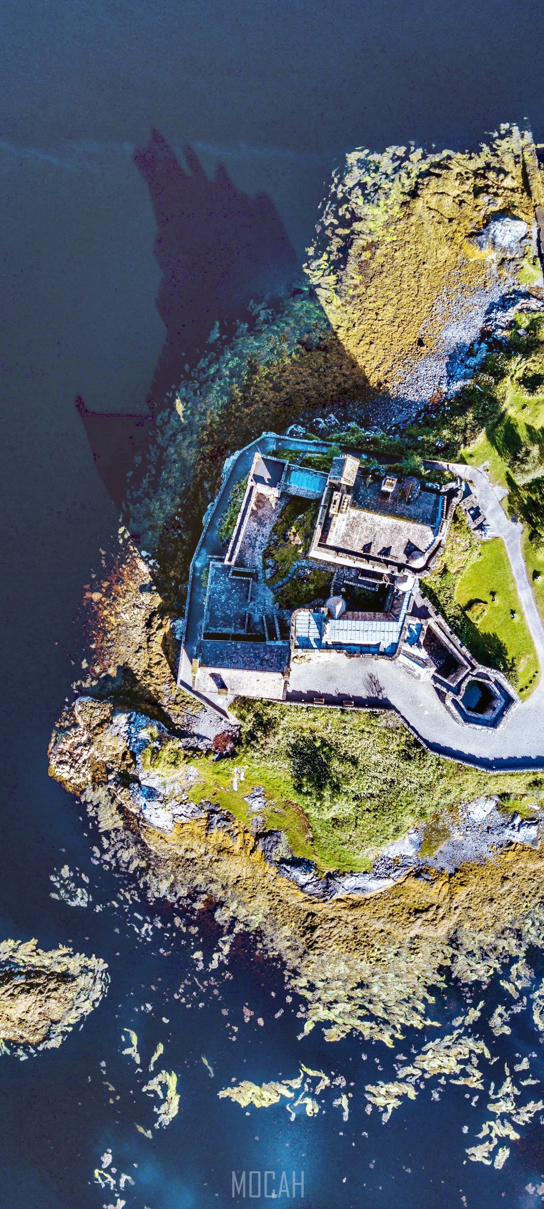 Aerial view of a stone fort on a rocky island HD Phone Wallpaper