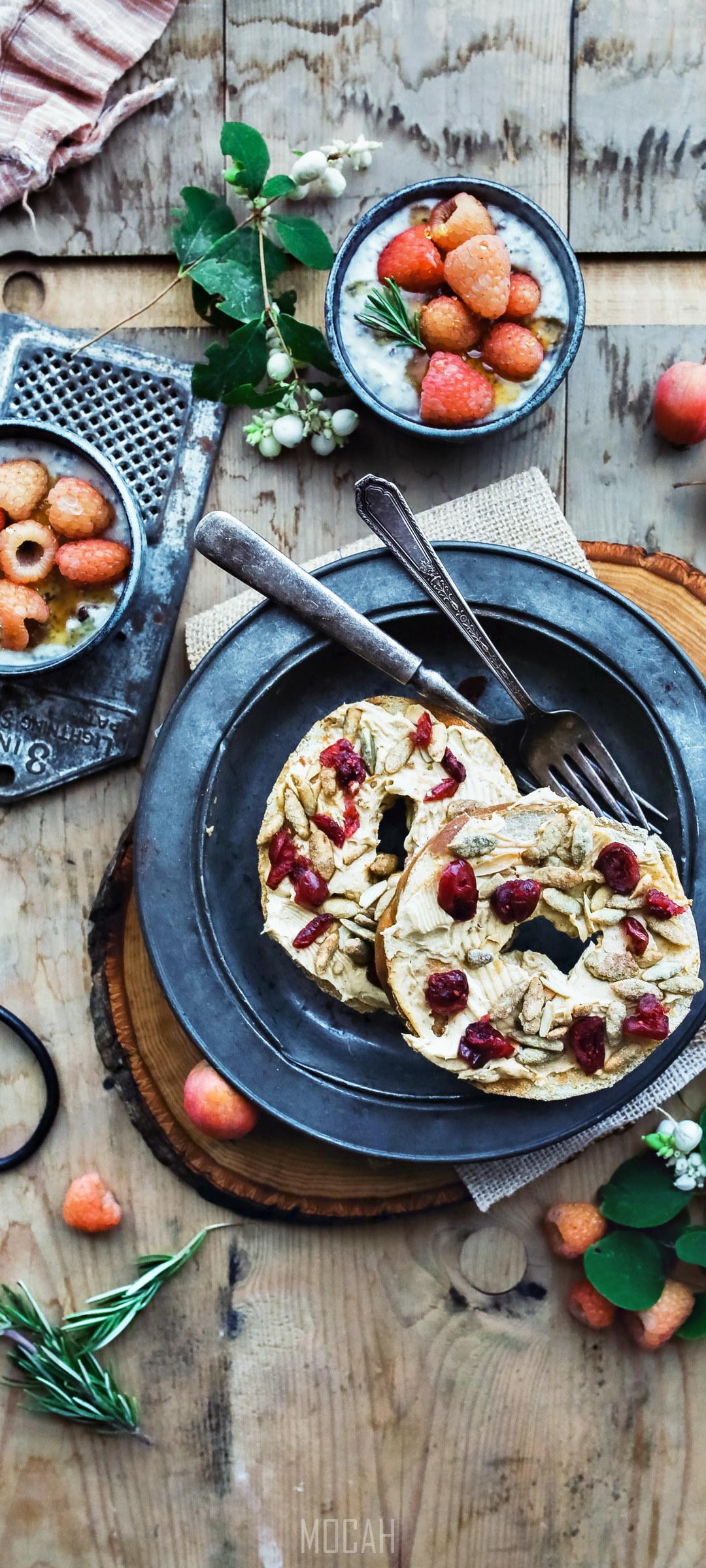 Bagels with toppings and berries in bowls HD Phone Wallpaper