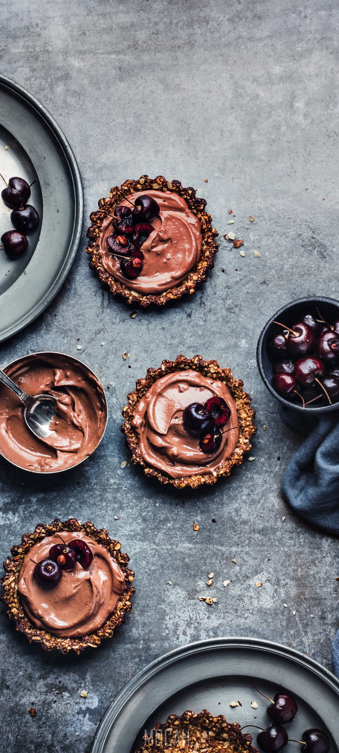 Chocolate tarts with cherries and a bowl of chocolate mousse HD Phone Wallpaper
