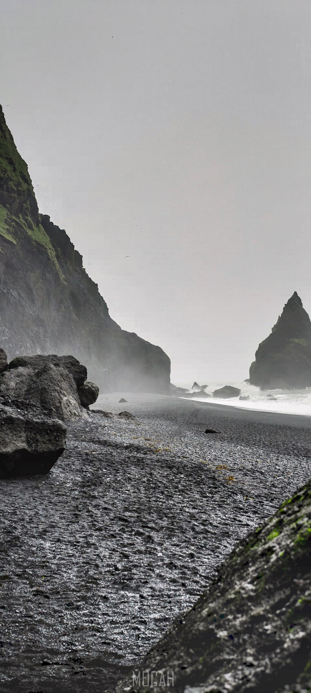 Black sand beach with rocky cliffs and ocean waves HD Phone Wallpaper